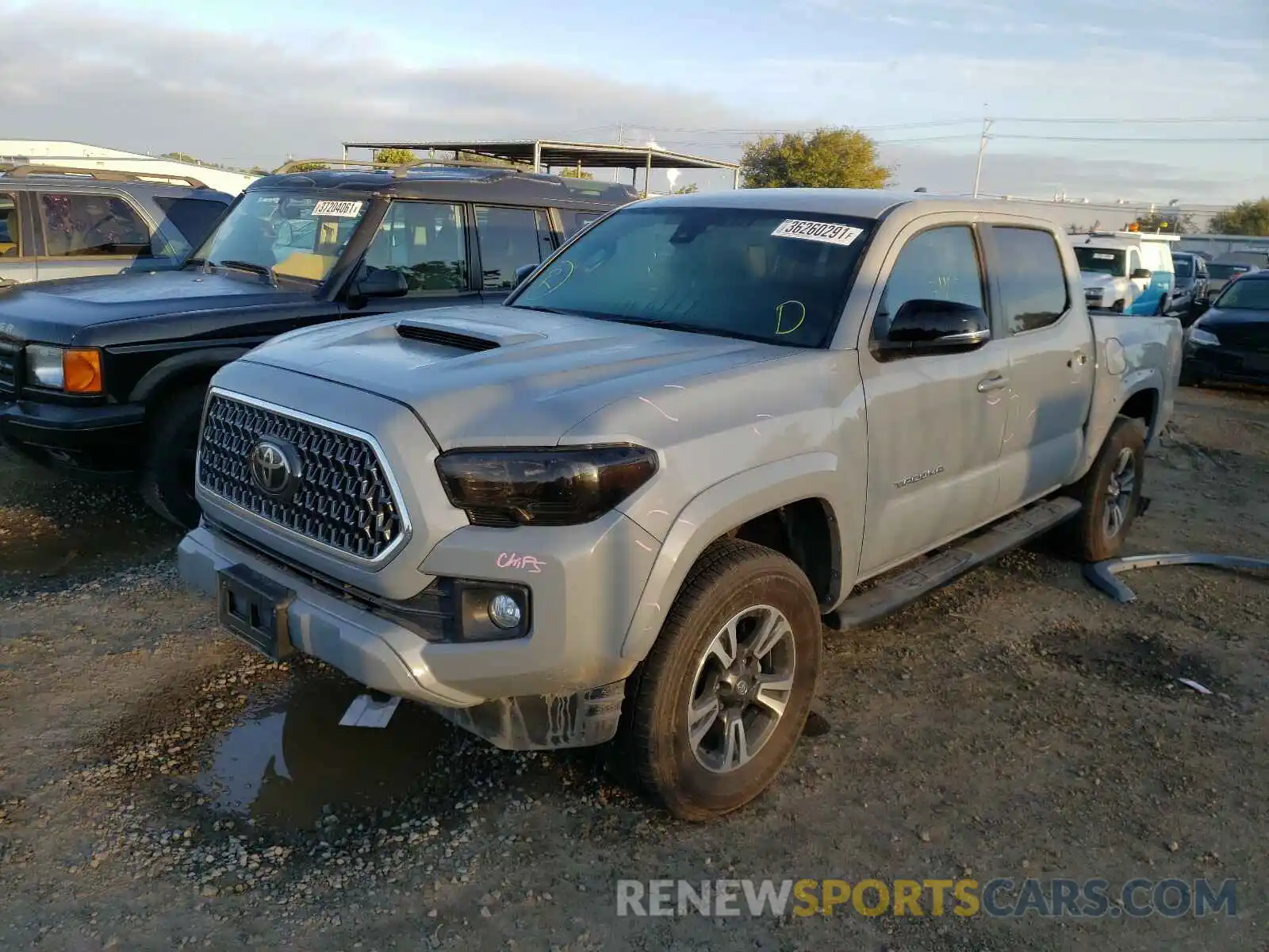 2 Photograph of a damaged car 3TMAZ5CN5KM112873 TOYOTA TACOMA 2019