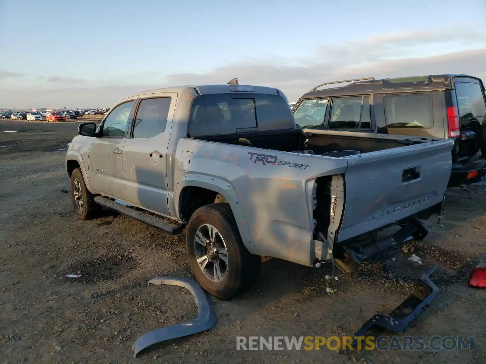 3 Photograph of a damaged car 3TMAZ5CN5KM112873 TOYOTA TACOMA 2019