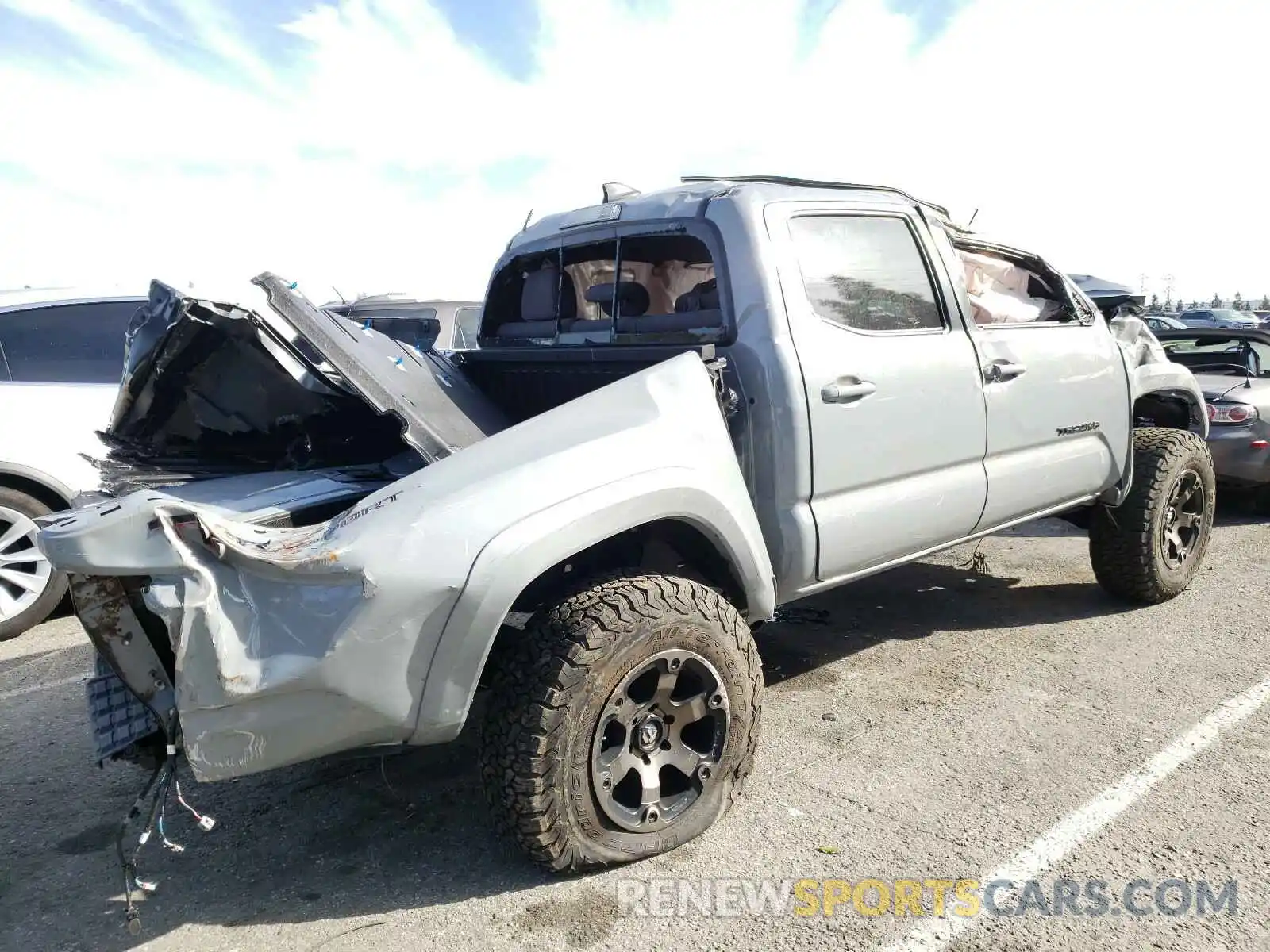 4 Photograph of a damaged car 3TMAZ5CN5KM113022 TOYOTA TACOMA 2019