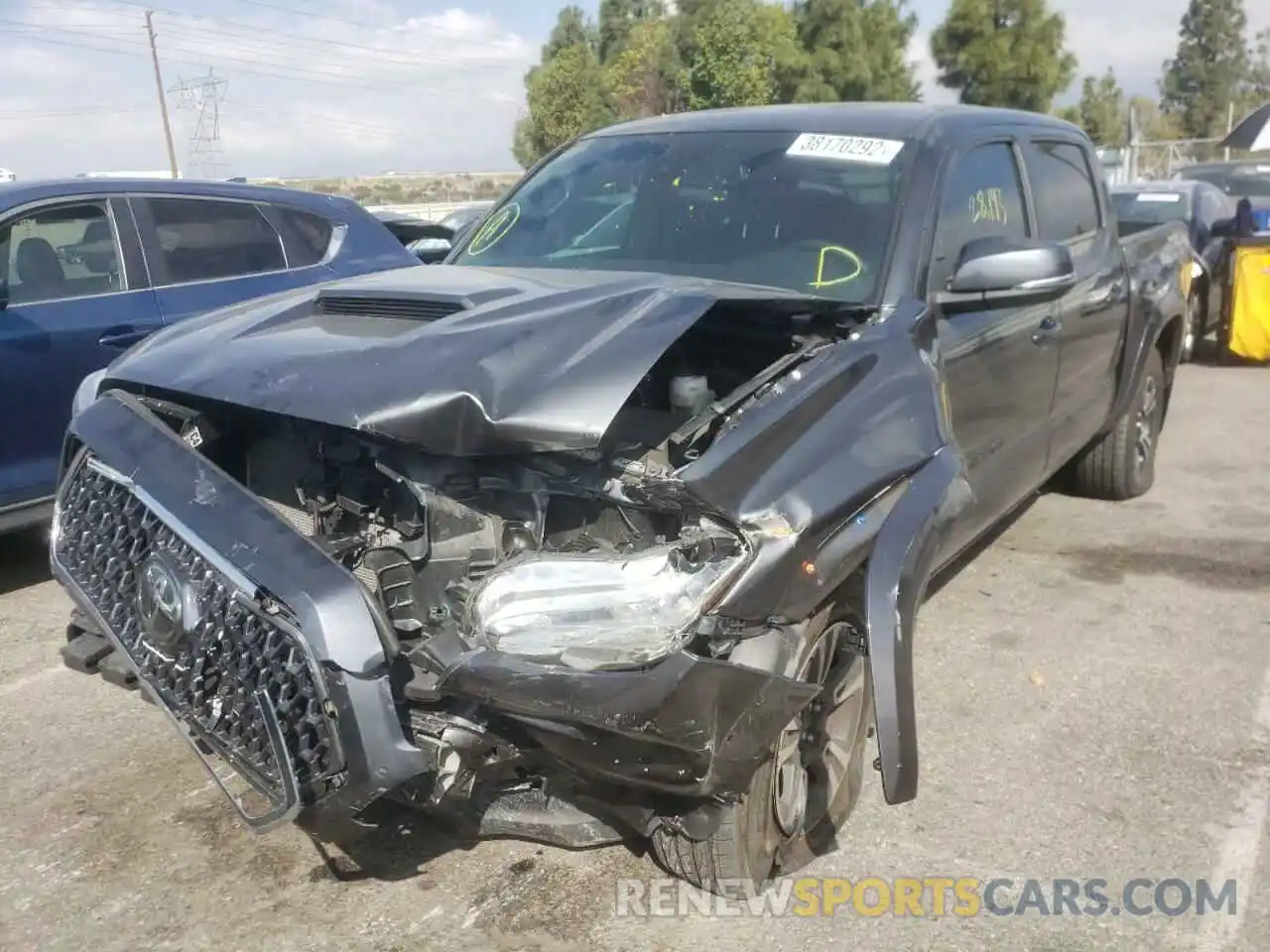 2 Photograph of a damaged car 3TMAZ5CN5KM113845 TOYOTA TACOMA 2019