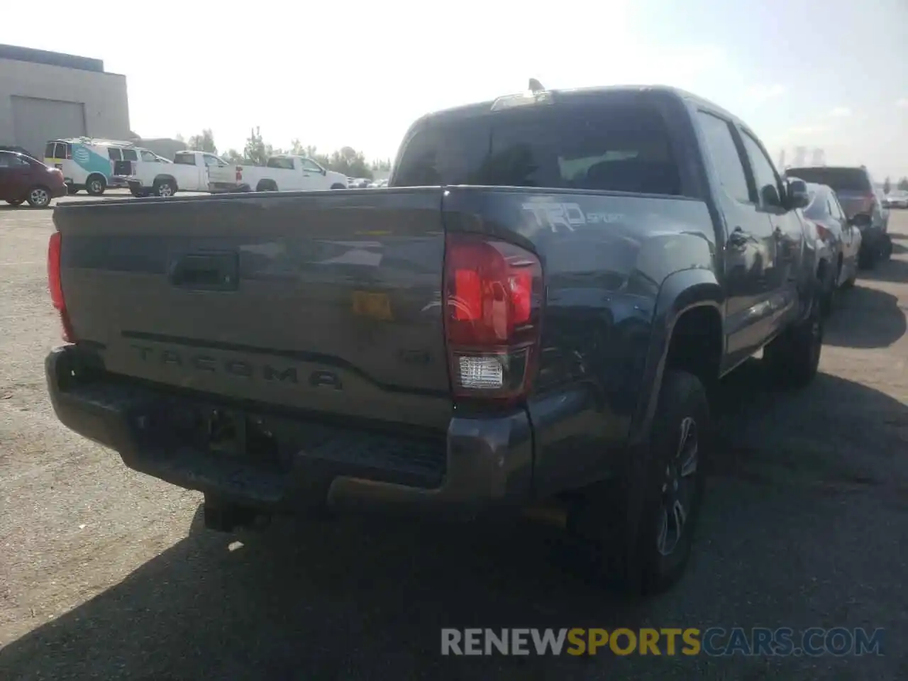 4 Photograph of a damaged car 3TMAZ5CN5KM113845 TOYOTA TACOMA 2019