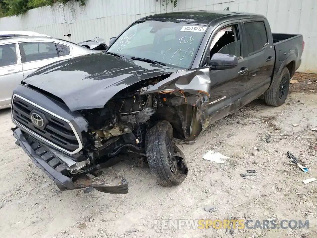 2 Photograph of a damaged car 3TMAZ5CN5KM114302 TOYOTA TACOMA 2019