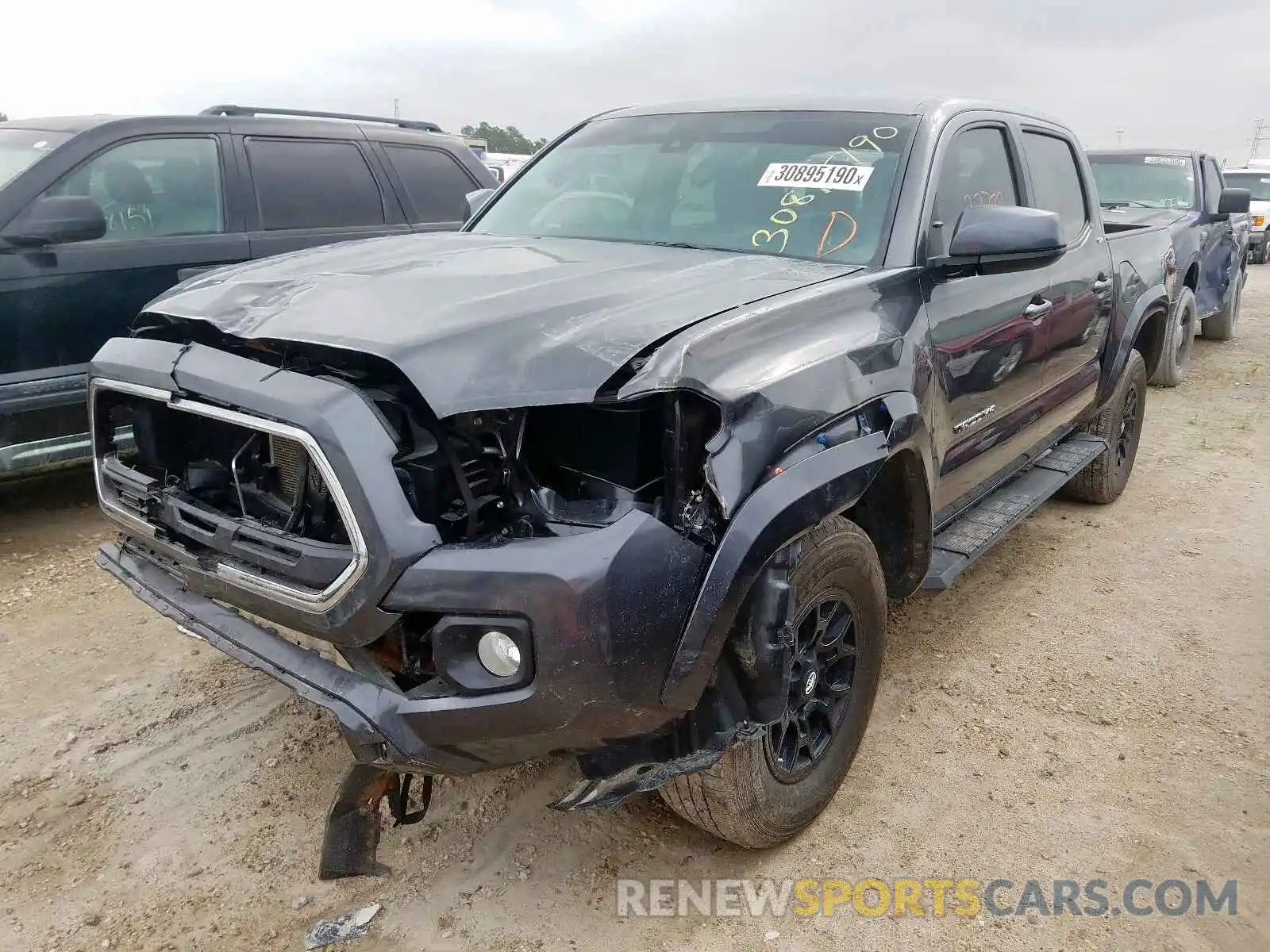 2 Photograph of a damaged car 3TMAZ5CN6KM083013 TOYOTA TACOMA 2019