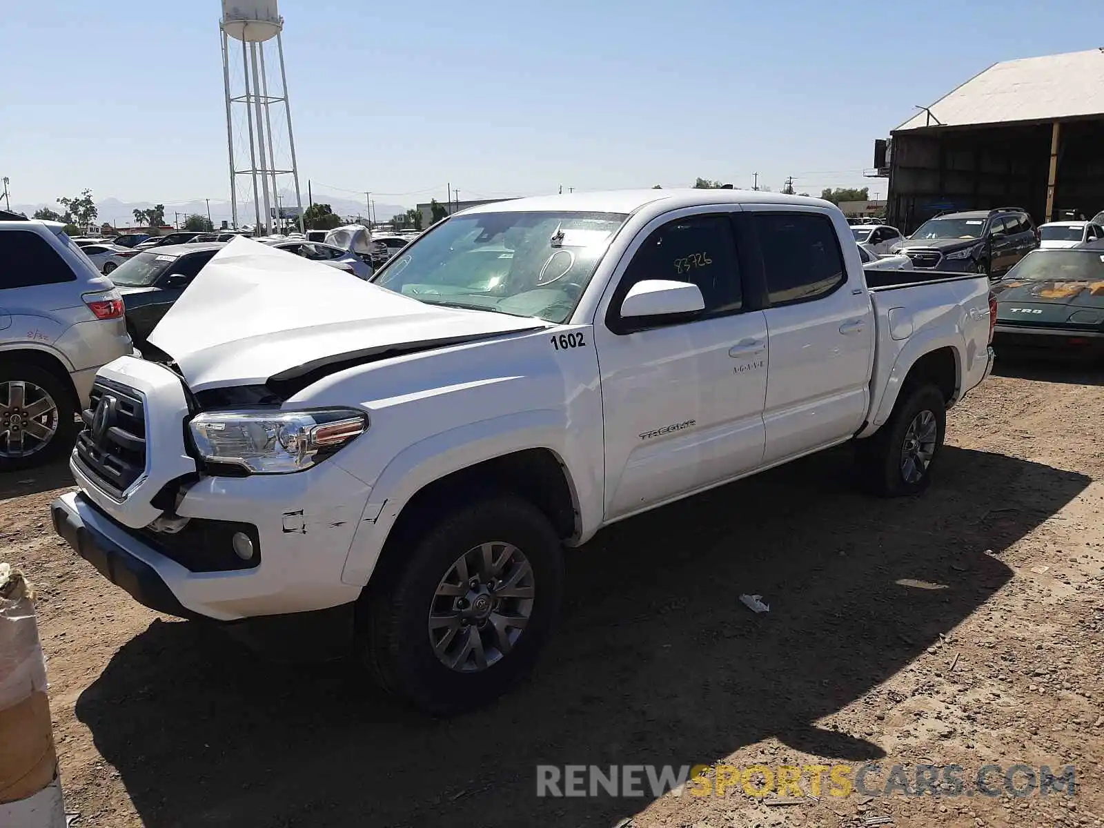 2 Photograph of a damaged car 3TMAZ5CN6KM084159 TOYOTA TACOMA 2019