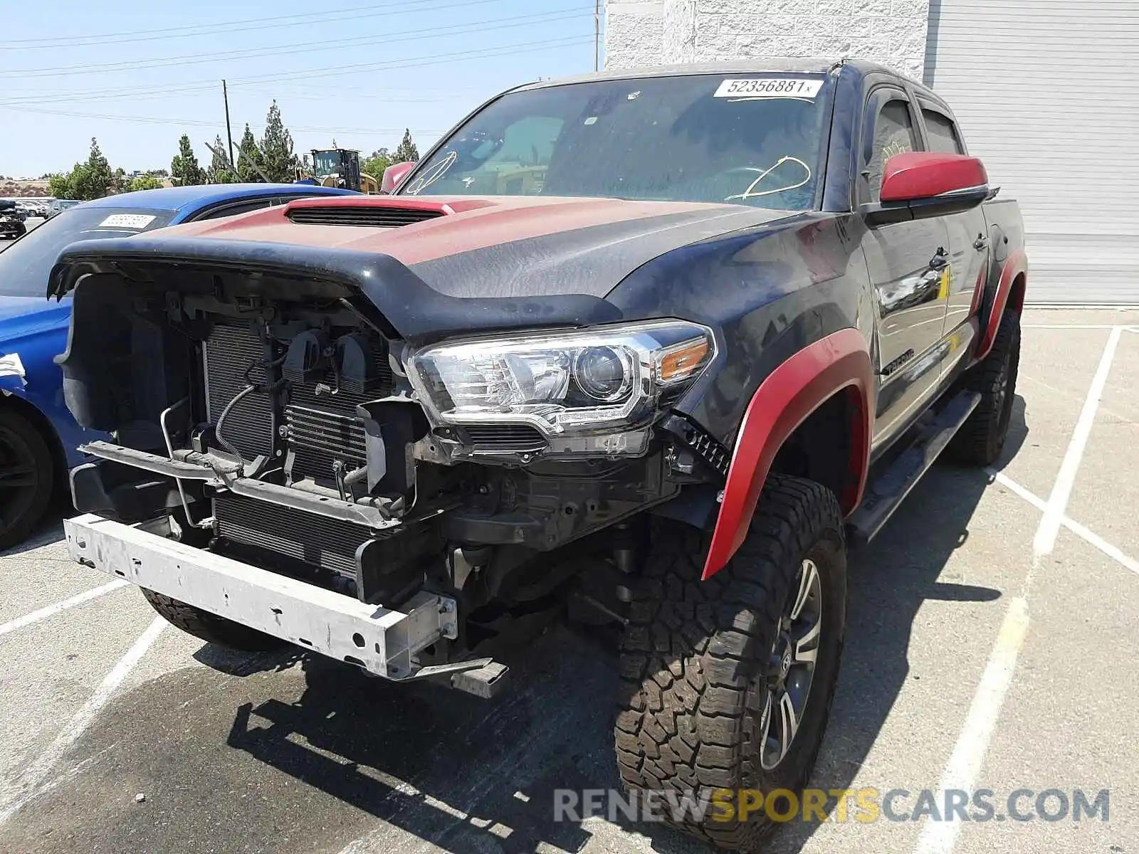 2 Photograph of a damaged car 3TMAZ5CN6KM084761 TOYOTA TACOMA 2019