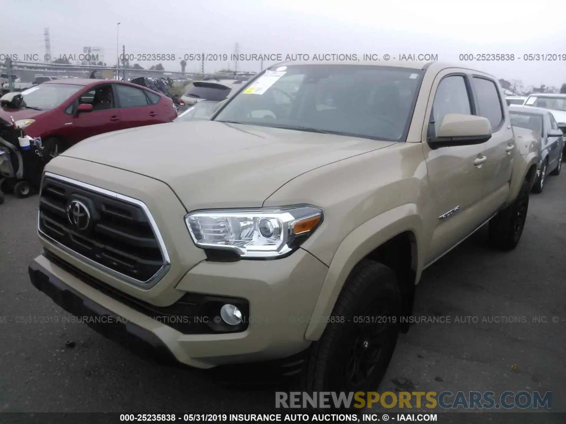 2 Photograph of a damaged car 3TMAZ5CN6KM086283 TOYOTA TACOMA 2019