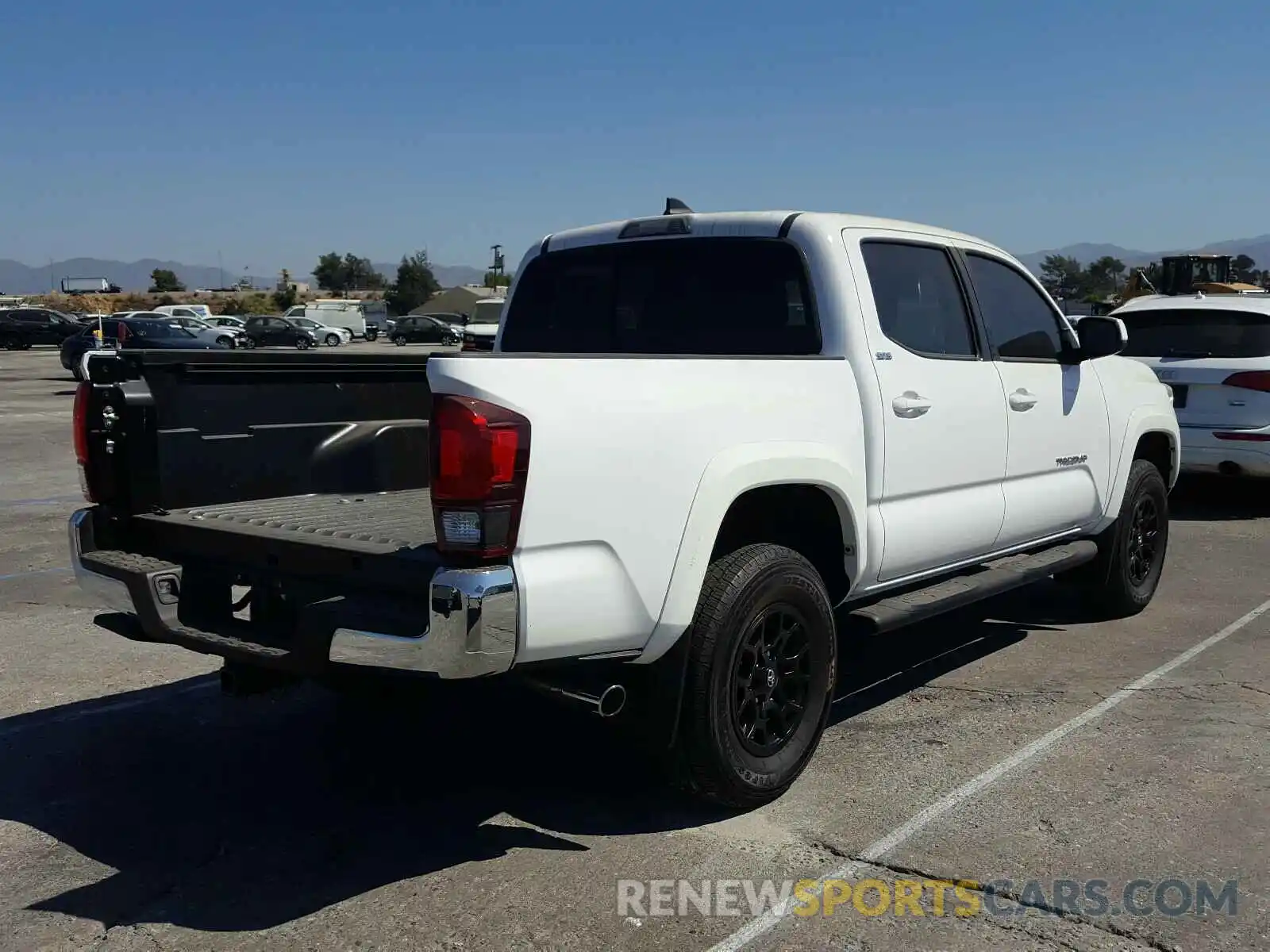 4 Photograph of a damaged car 3TMAZ5CN6KM087742 TOYOTA TACOMA 2019