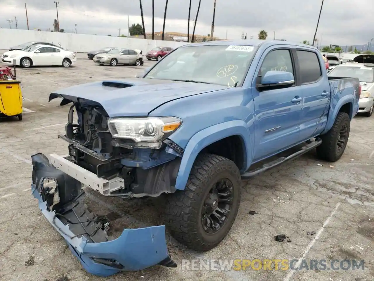 2 Photograph of a damaged car 3TMAZ5CN6KM090611 TOYOTA TACOMA 2019