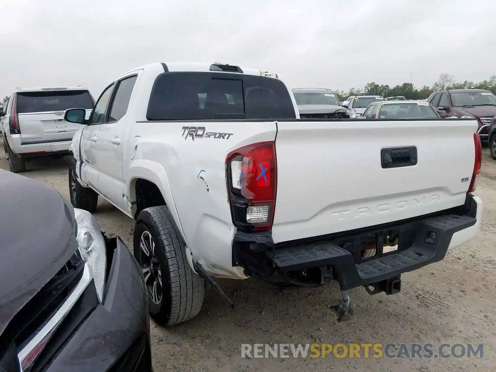 3 Photograph of a damaged car 3TMAZ5CN6KM092116 TOYOTA TACOMA 2019