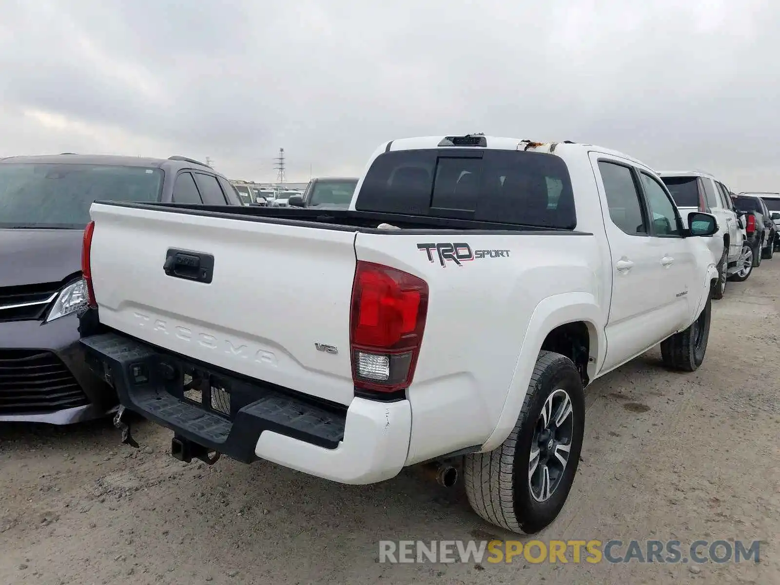 4 Photograph of a damaged car 3TMAZ5CN6KM092116 TOYOTA TACOMA 2019