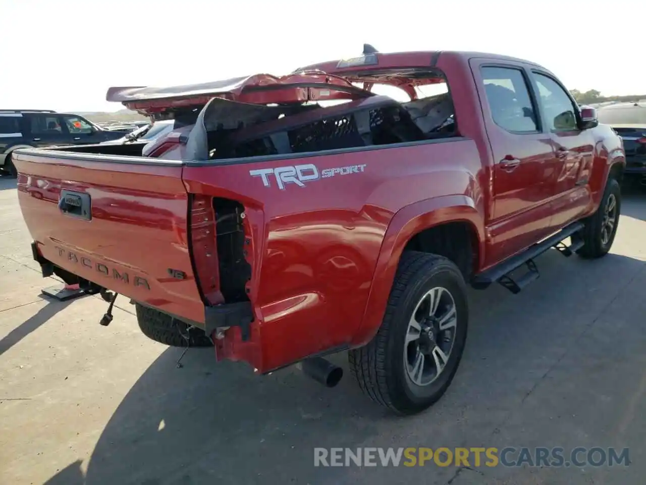 4 Photograph of a damaged car 3TMAZ5CN6KM093735 TOYOTA TACOMA 2019