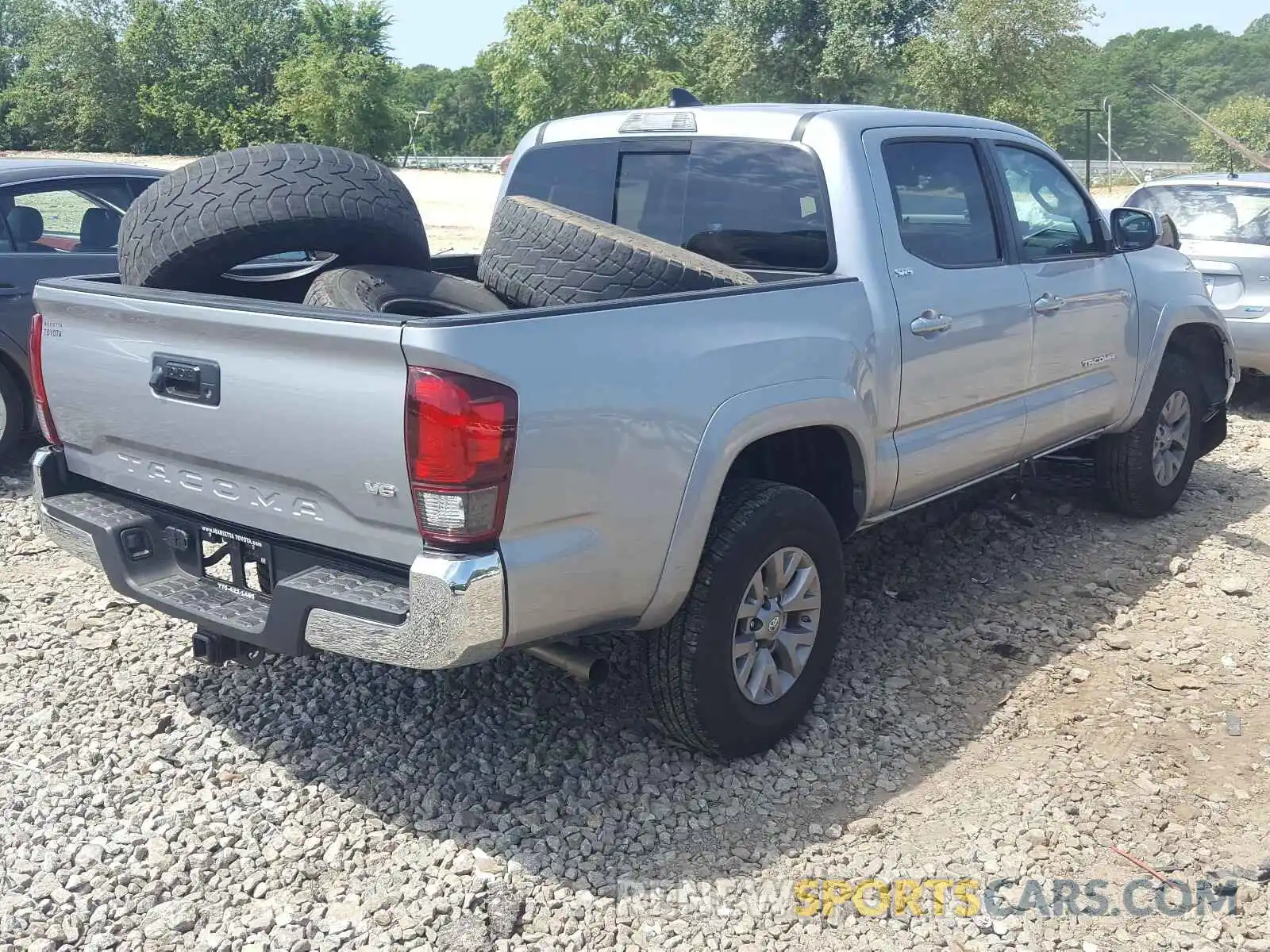 4 Photograph of a damaged car 3TMAZ5CN6KM095775 TOYOTA TACOMA 2019