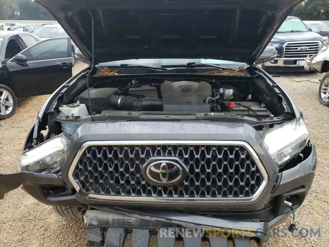 7 Photograph of a damaged car 3TMAZ5CN6KM096599 TOYOTA TACOMA 2019