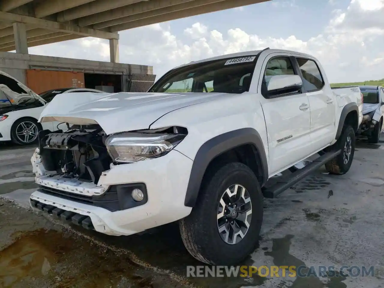 2 Photograph of a damaged car 3TMAZ5CN6KM097400 TOYOTA TACOMA 2019