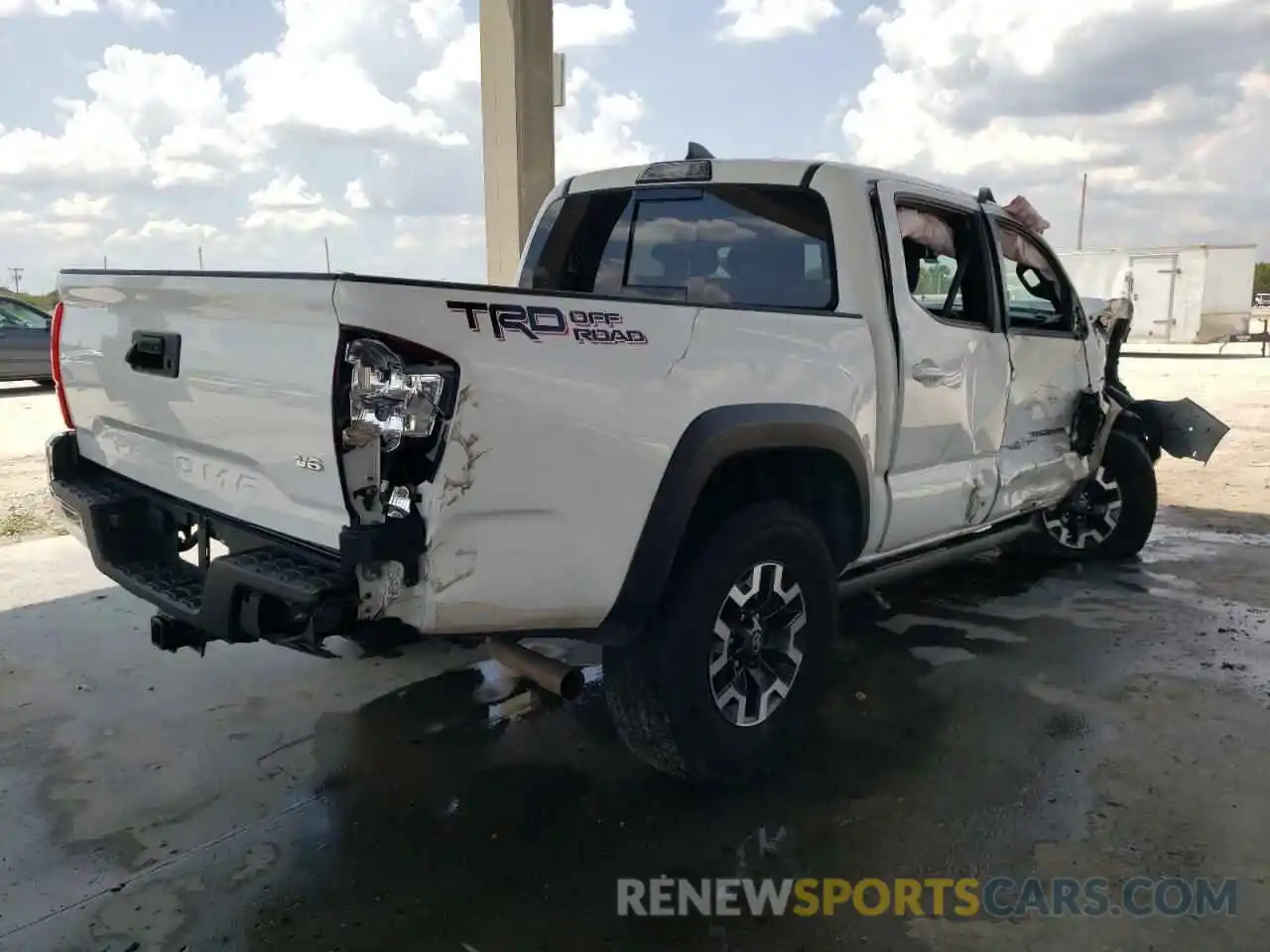 4 Photograph of a damaged car 3TMAZ5CN6KM097400 TOYOTA TACOMA 2019