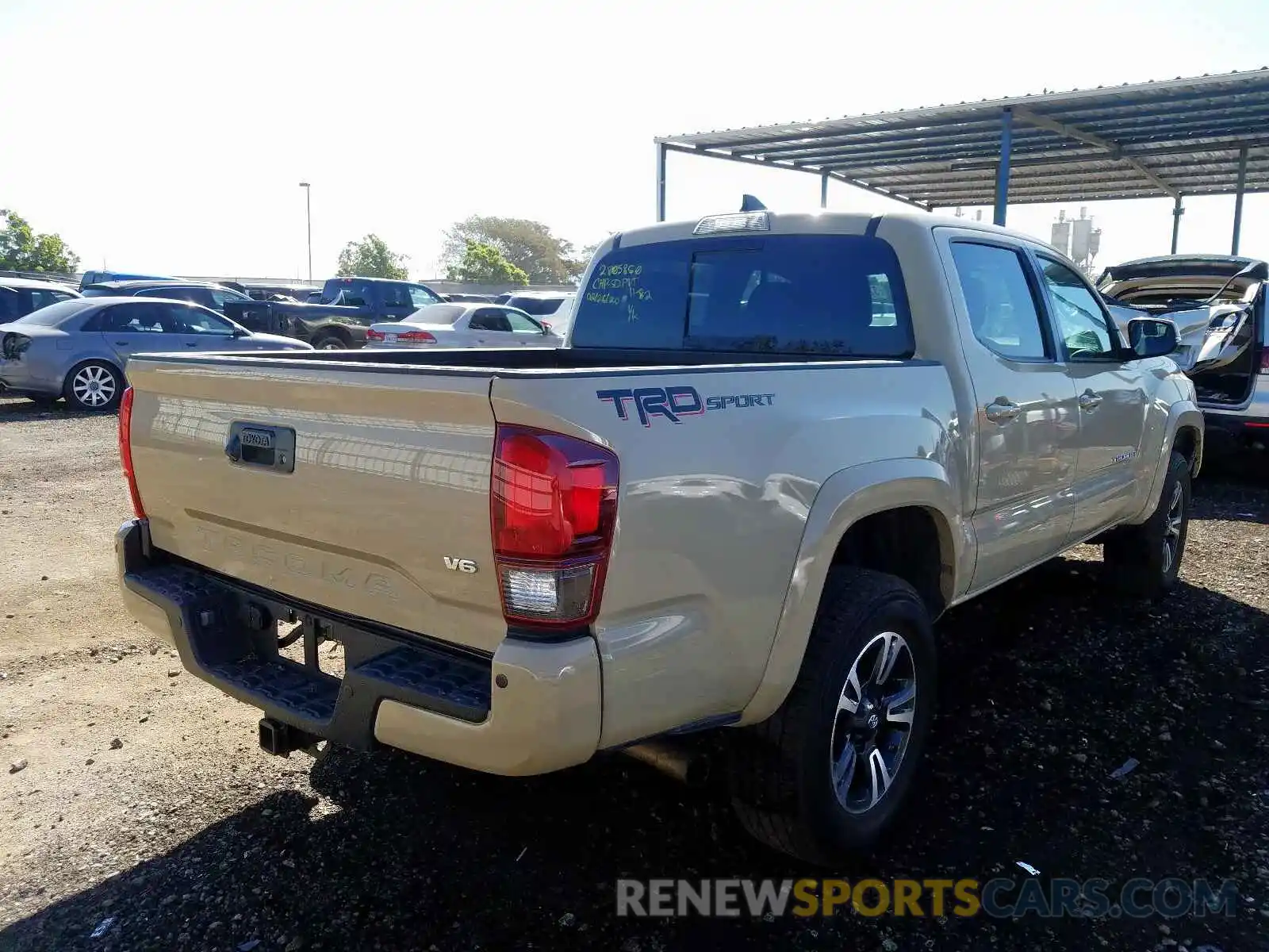 4 Photograph of a damaged car 3TMAZ5CN6KM100067 TOYOTA TACOMA 2019