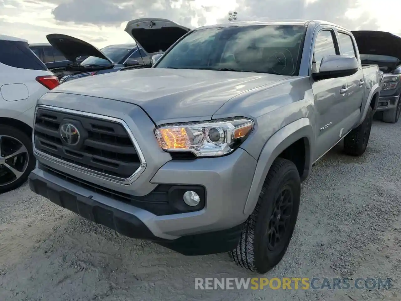 2 Photograph of a damaged car 3TMAZ5CN6KM100165 TOYOTA TACOMA 2019