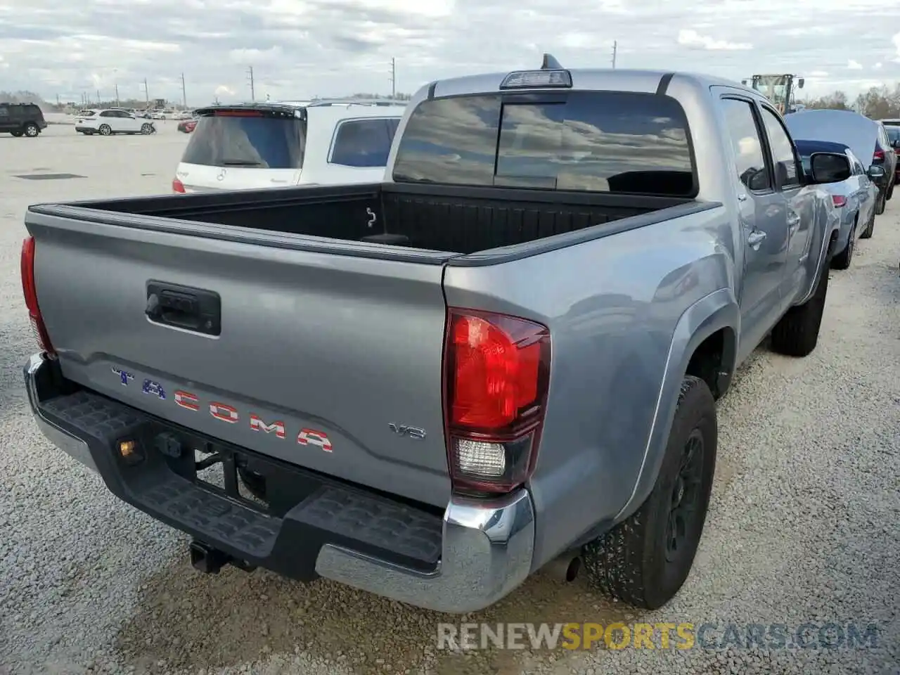 4 Photograph of a damaged car 3TMAZ5CN6KM100165 TOYOTA TACOMA 2019