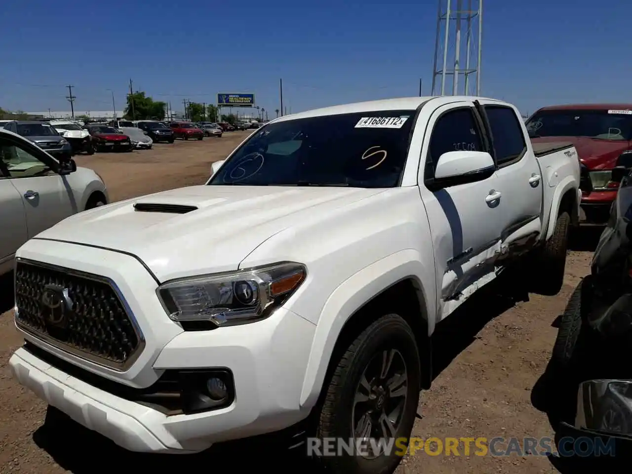 2 Photograph of a damaged car 3TMAZ5CN6KM101171 TOYOTA TACOMA 2019