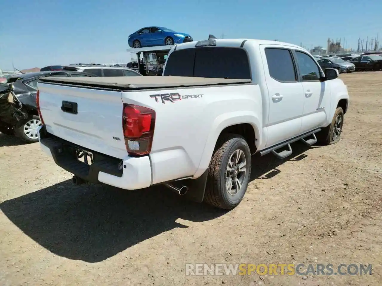 4 Photograph of a damaged car 3TMAZ5CN6KM101171 TOYOTA TACOMA 2019