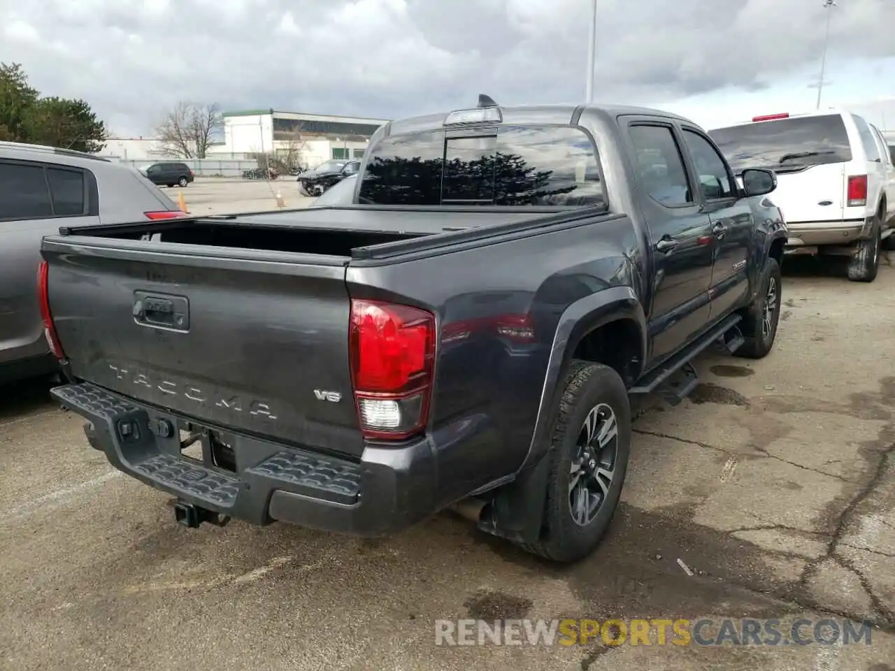 4 Photograph of a damaged car 3TMAZ5CN6KM102191 TOYOTA TACOMA 2019