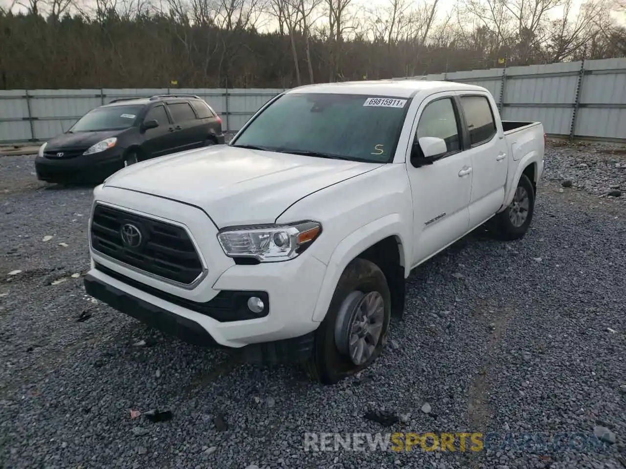 2 Photograph of a damaged car 3TMAZ5CN6KM102661 TOYOTA TACOMA 2019