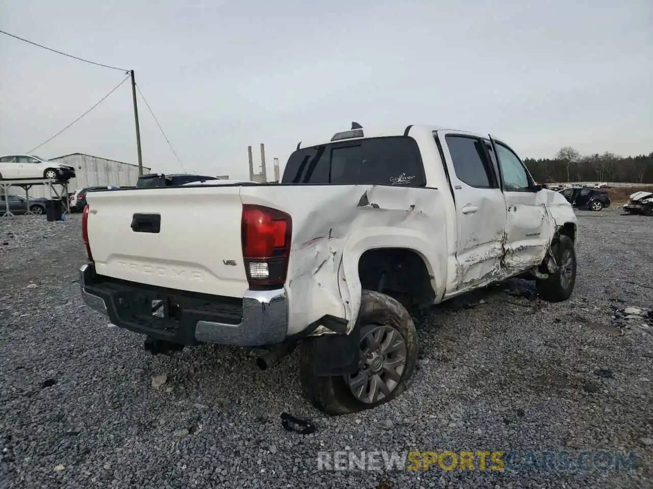 4 Photograph of a damaged car 3TMAZ5CN6KM102661 TOYOTA TACOMA 2019