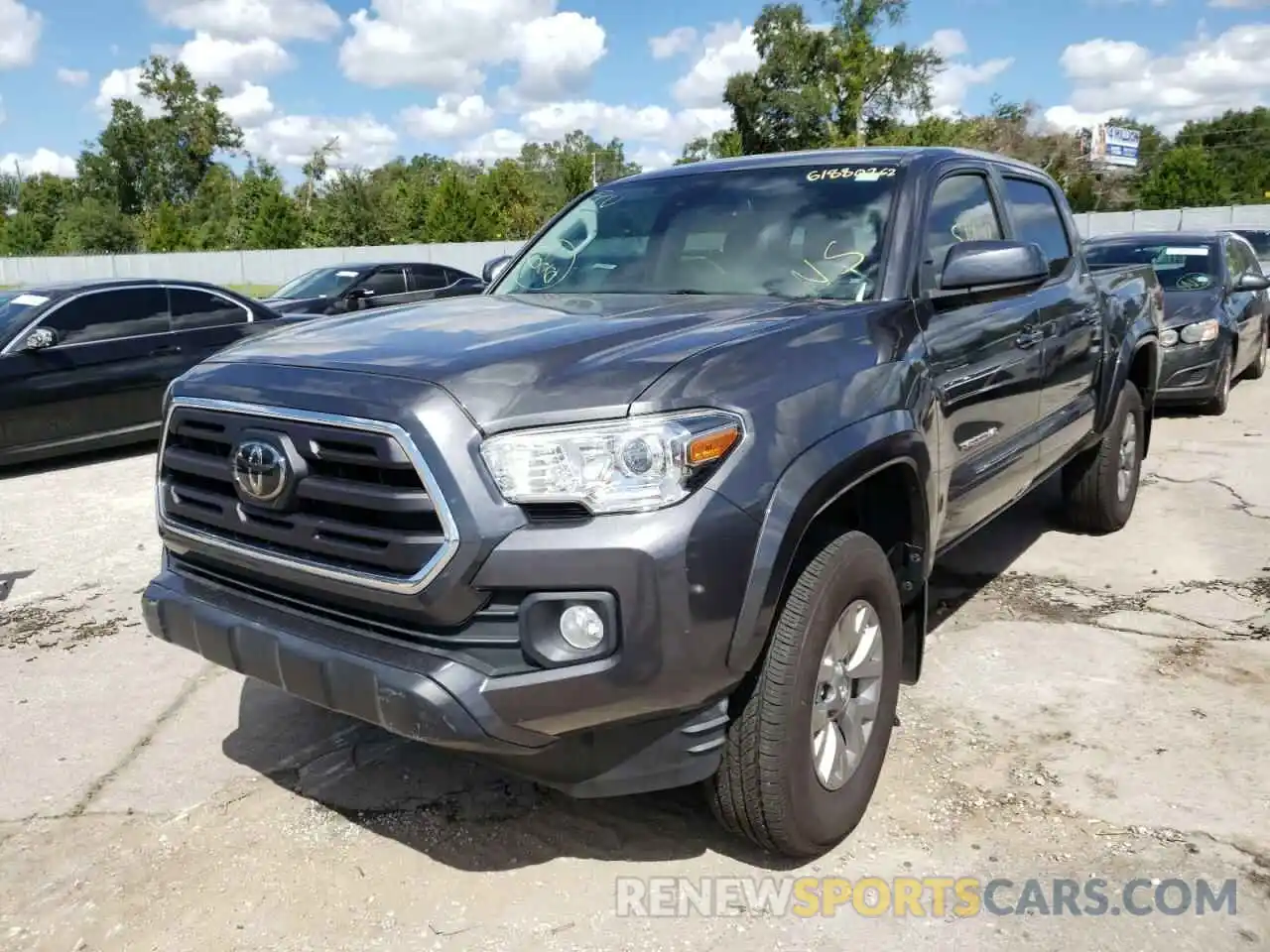 2 Photograph of a damaged car 3TMAZ5CN6KM105009 TOYOTA TACOMA 2019