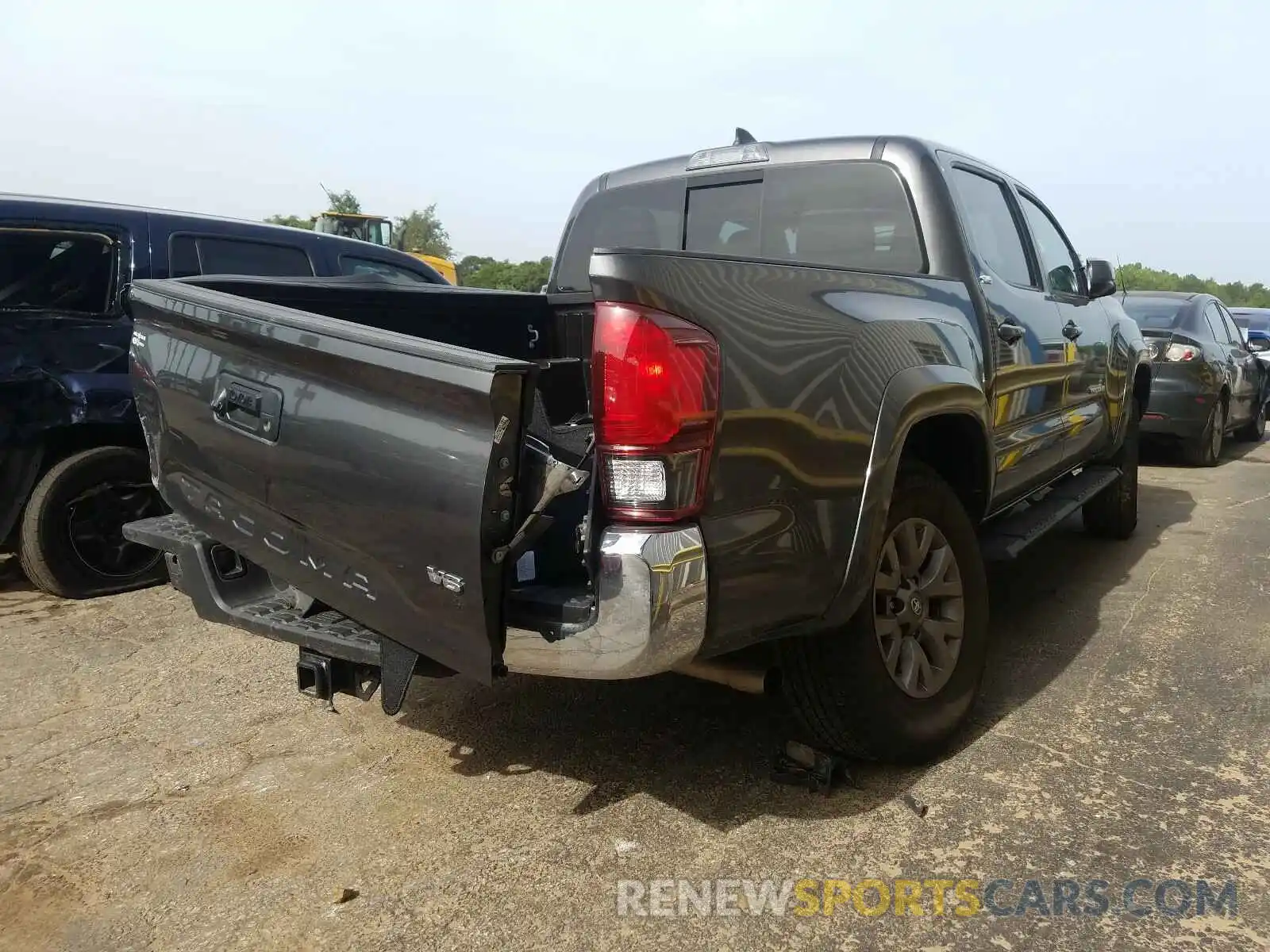 4 Photograph of a damaged car 3TMAZ5CN6KM105222 TOYOTA TACOMA 2019