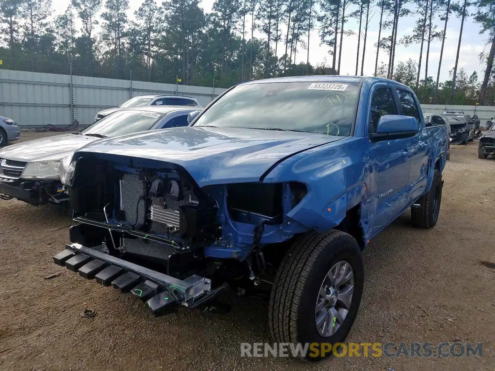 2 Photograph of a damaged car 3TMAZ5CN6KM106371 TOYOTA TACOMA 2019