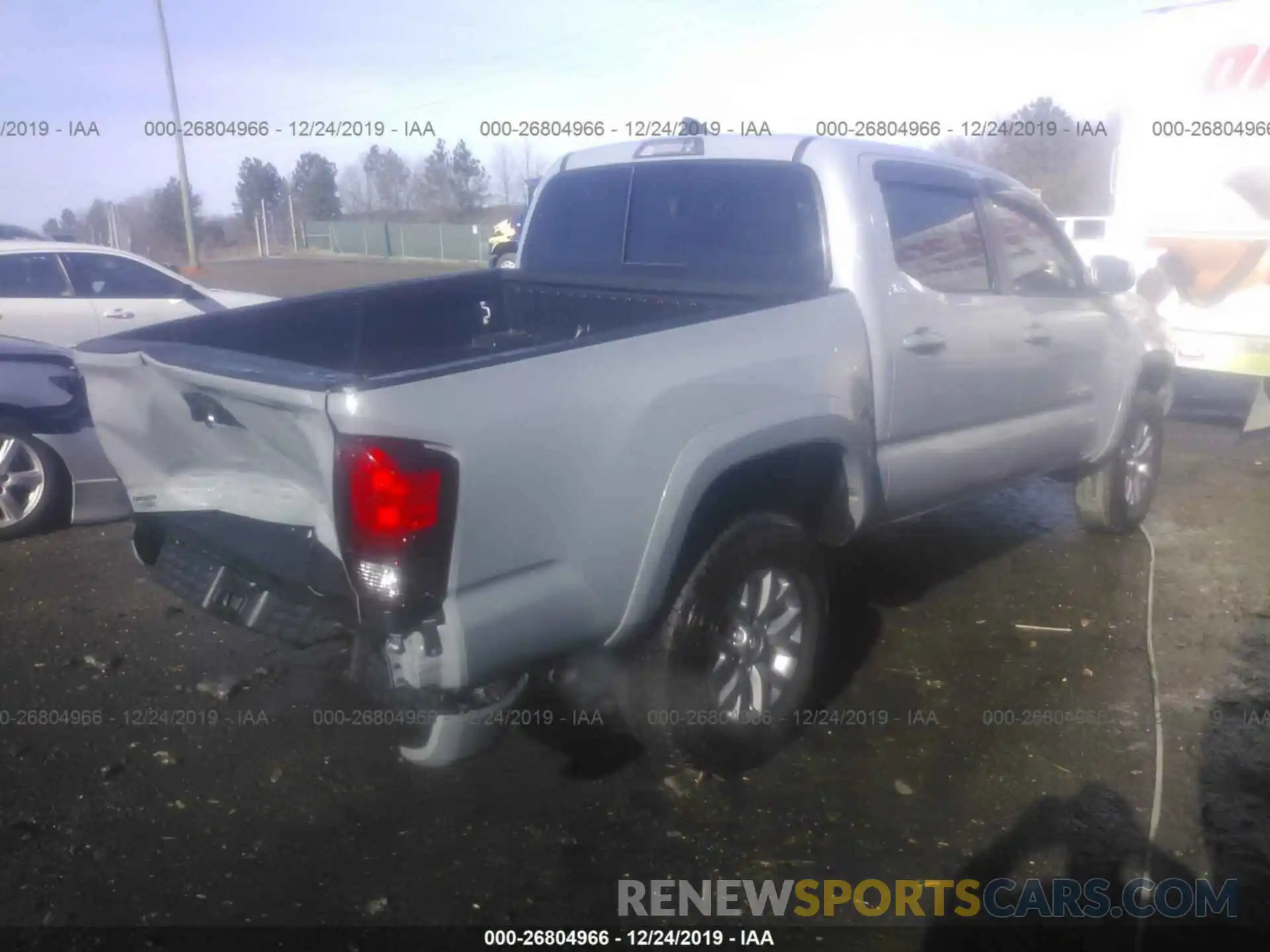 4 Photograph of a damaged car 3TMAZ5CN6KM108489 TOYOTA TACOMA 2019