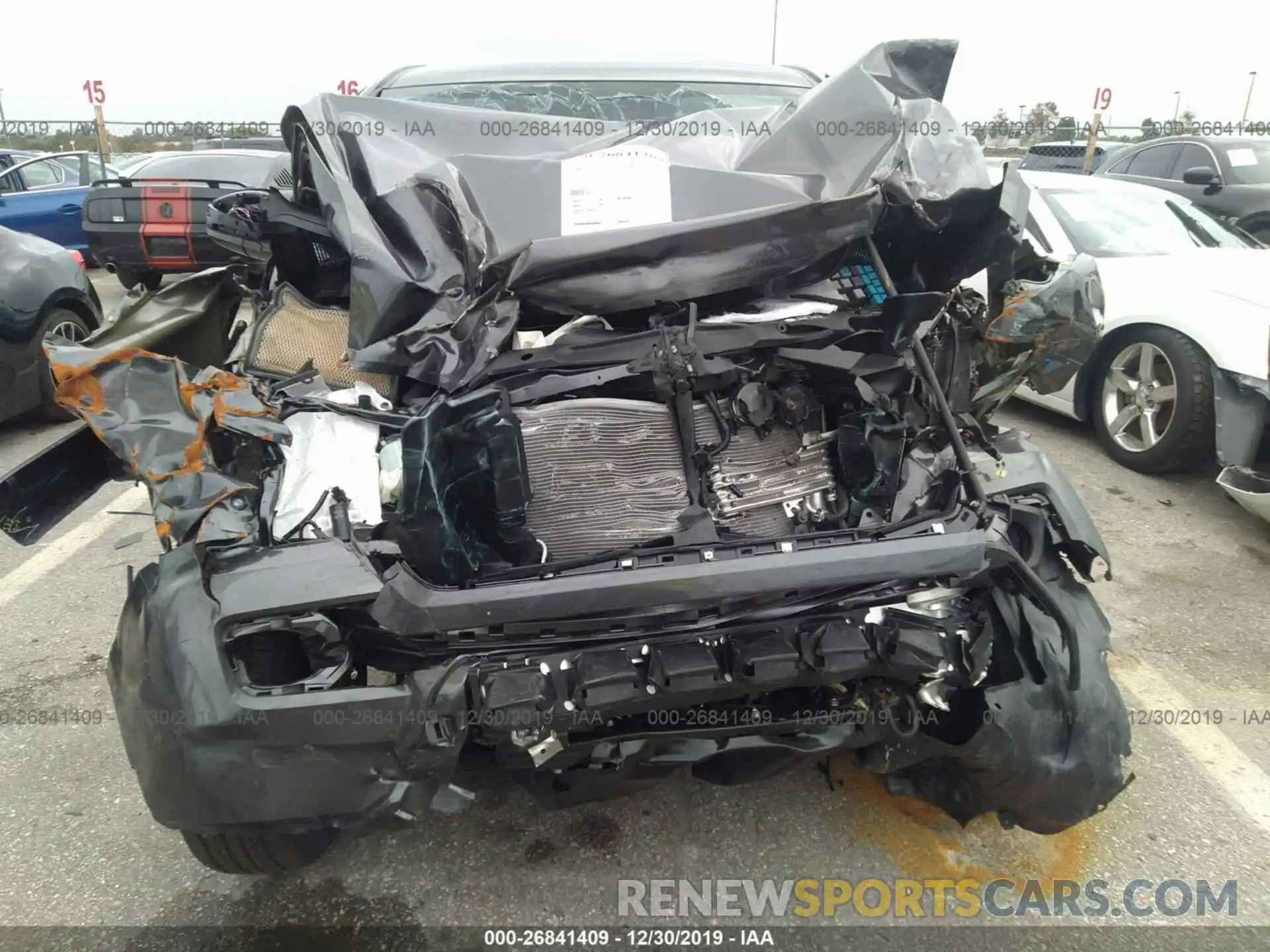 6 Photograph of a damaged car 3TMAZ5CN6KM109657 TOYOTA TACOMA 2019