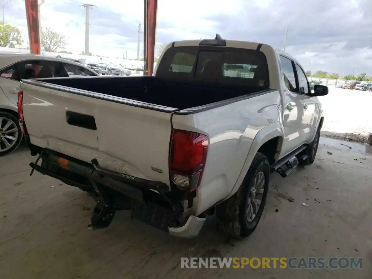 4 Photograph of a damaged car 3TMAZ5CN6KM111229 TOYOTA TACOMA 2019