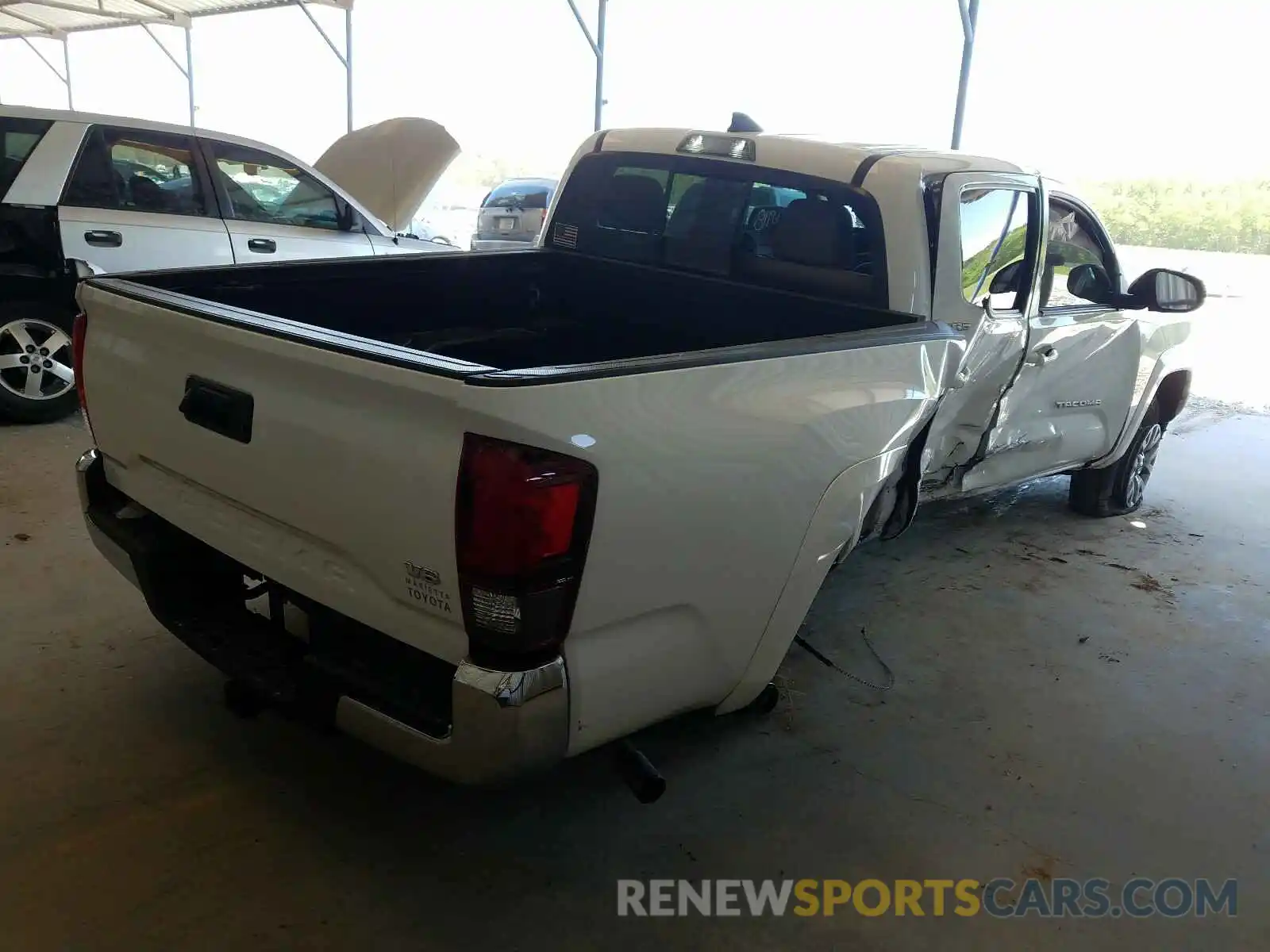 4 Photograph of a damaged car 3TMAZ5CN6KM111375 TOYOTA TACOMA 2019