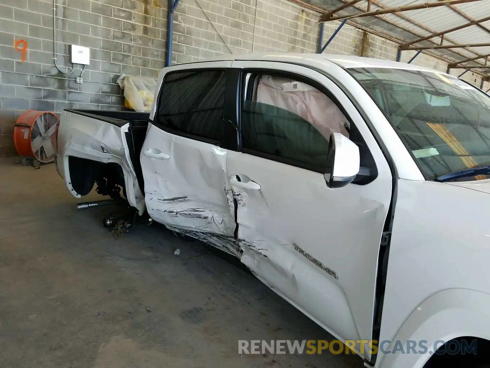 9 Photograph of a damaged car 3TMAZ5CN6KM111375 TOYOTA TACOMA 2019