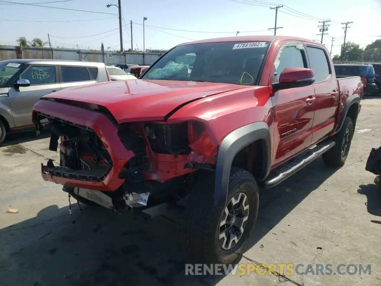 2 Photograph of a damaged car 3TMAZ5CN6KM113563 TOYOTA TACOMA 2019