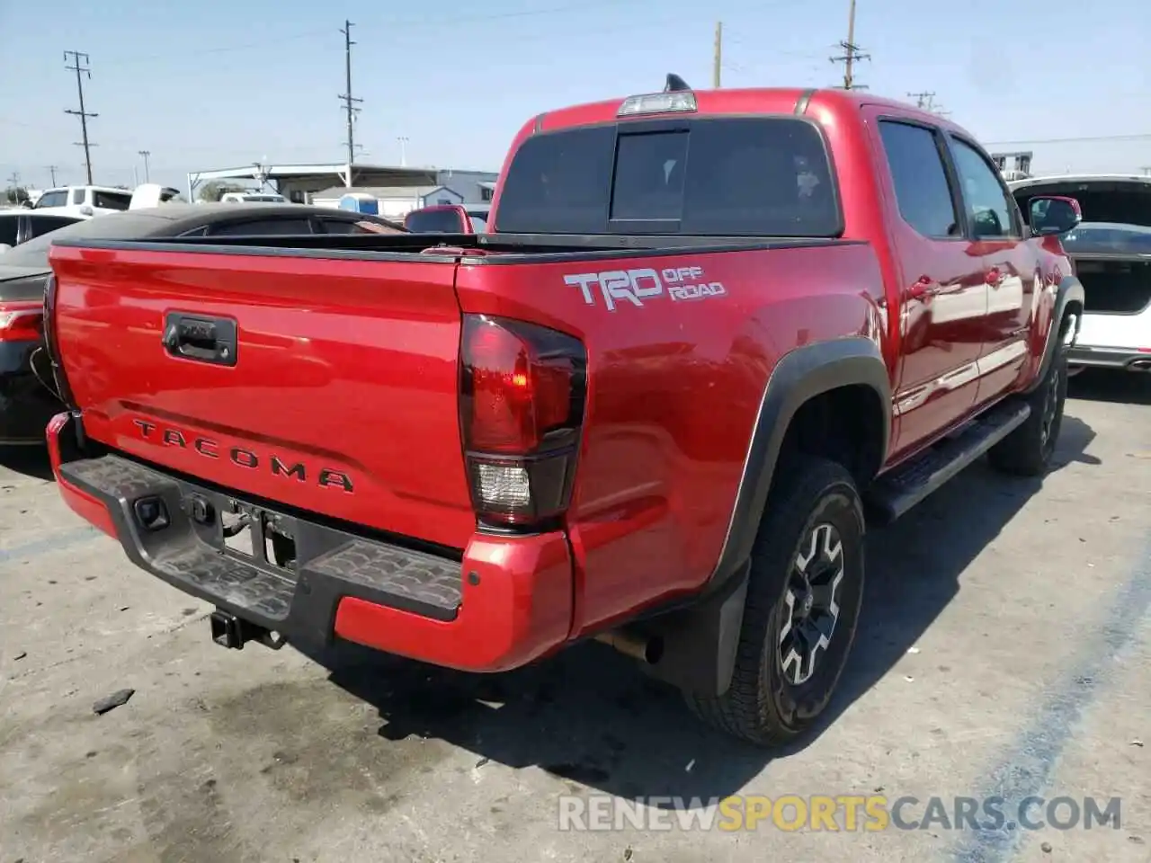 4 Photograph of a damaged car 3TMAZ5CN6KM113563 TOYOTA TACOMA 2019