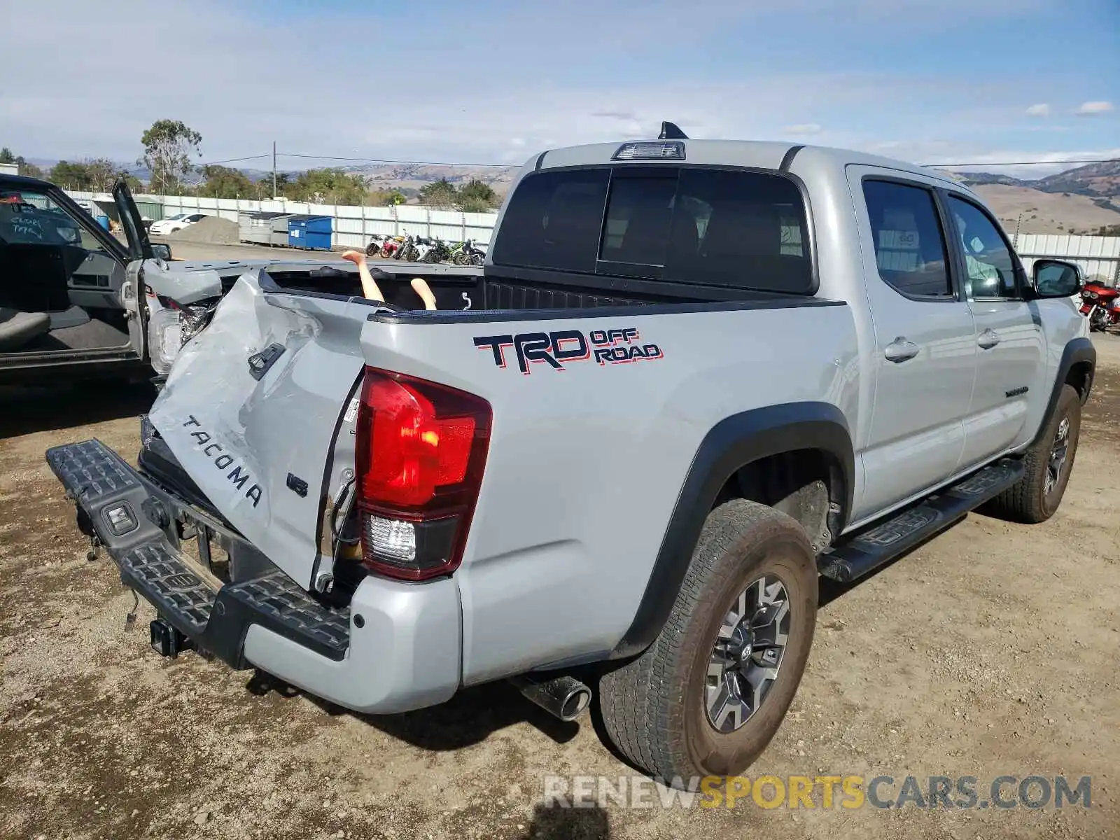 4 Photograph of a damaged car 3TMAZ5CN6KM113840 TOYOTA TACOMA 2019