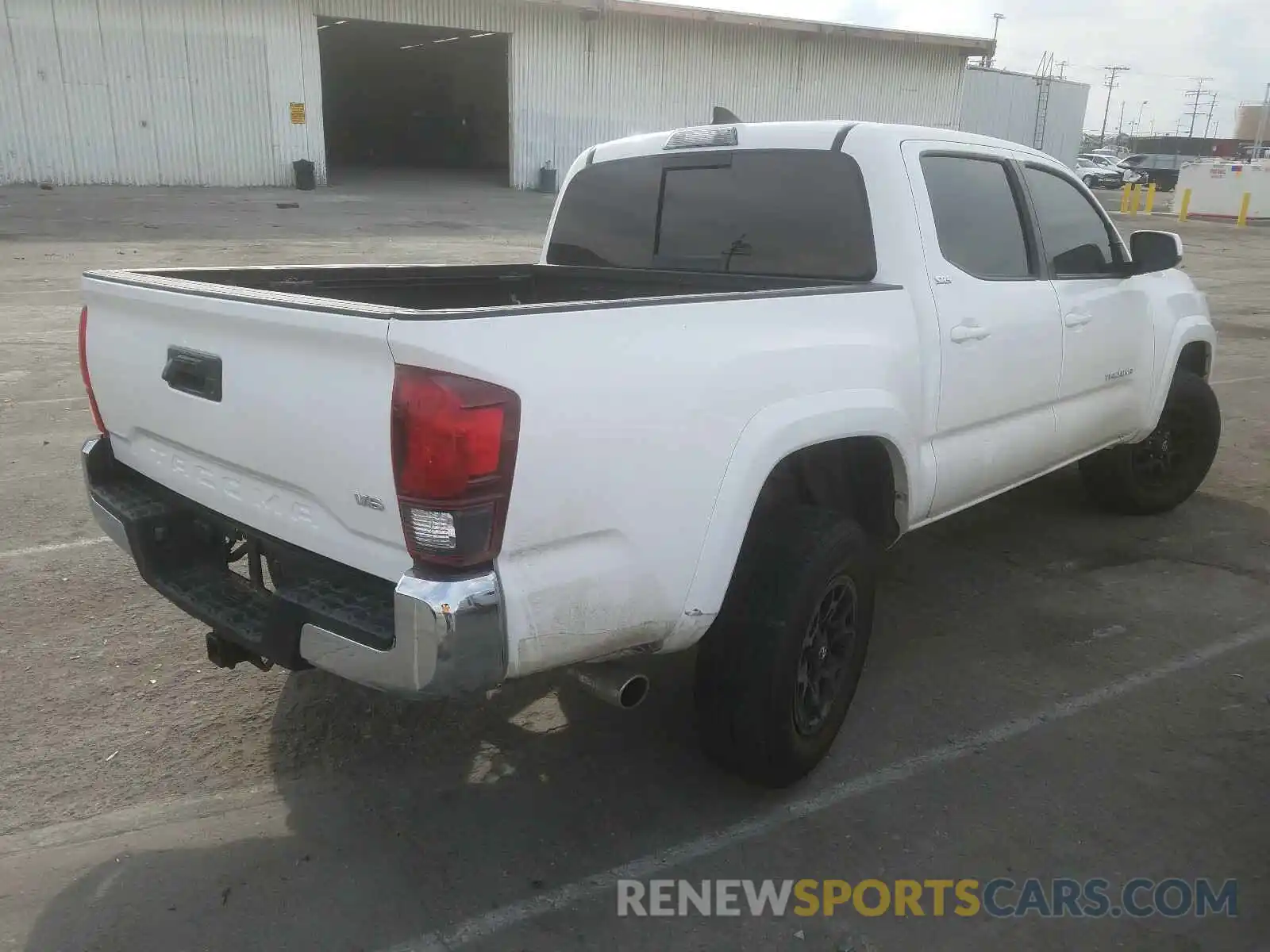 4 Photograph of a damaged car 3TMAZ5CN7KM080119 TOYOTA TACOMA 2019