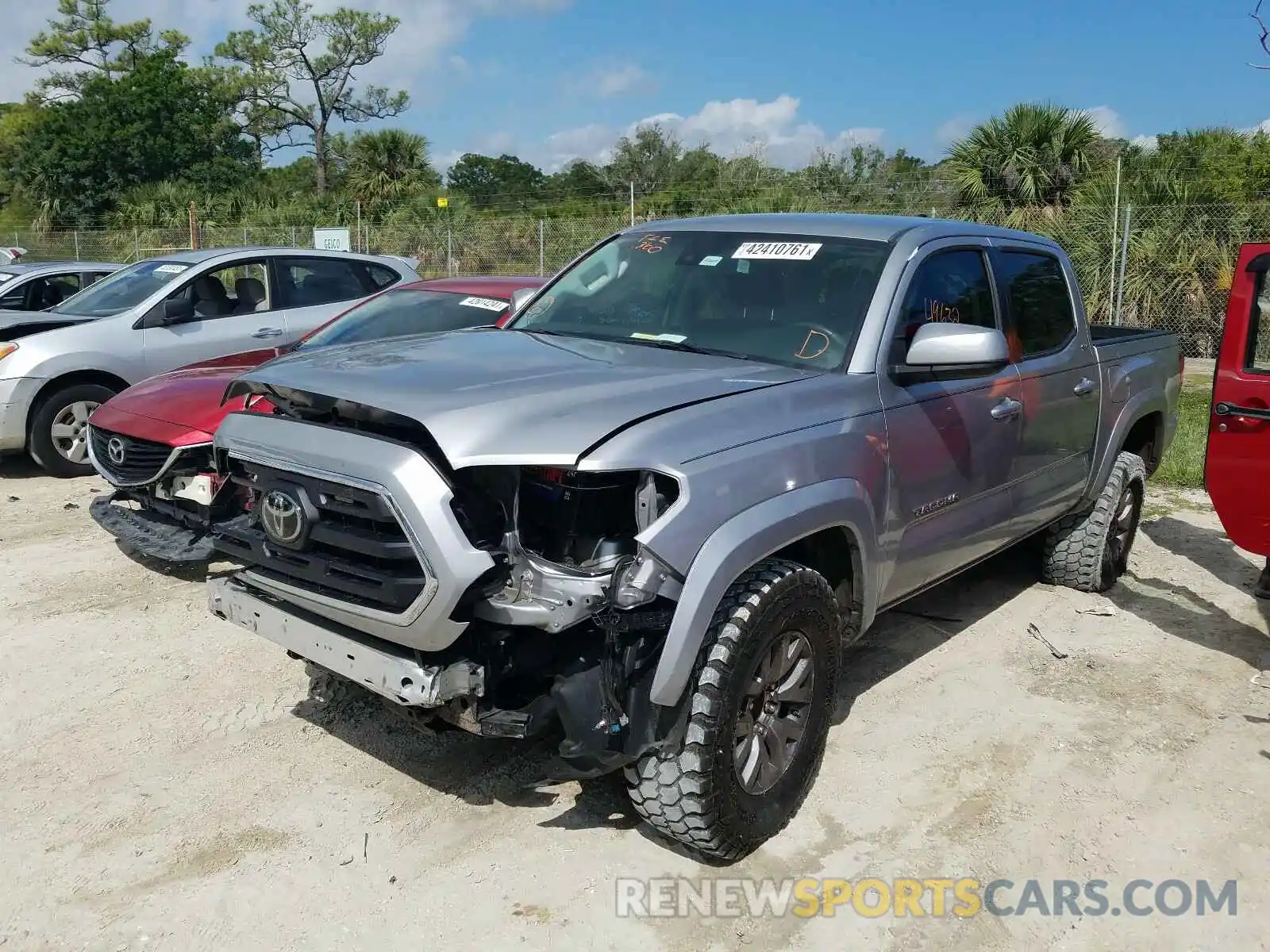 2 Photograph of a damaged car 3TMAZ5CN7KM081626 TOYOTA TACOMA 2019