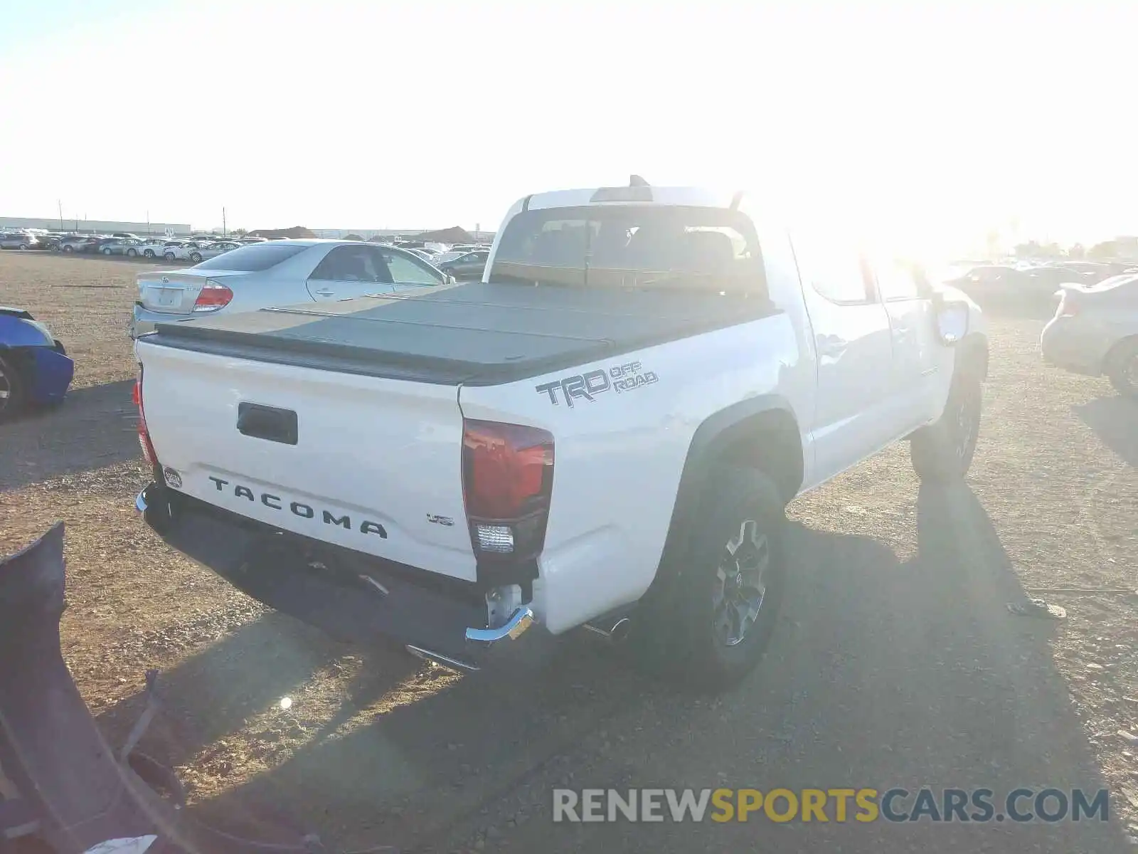 4 Photograph of a damaged car 3TMAZ5CN7KM082288 TOYOTA TACOMA 2019