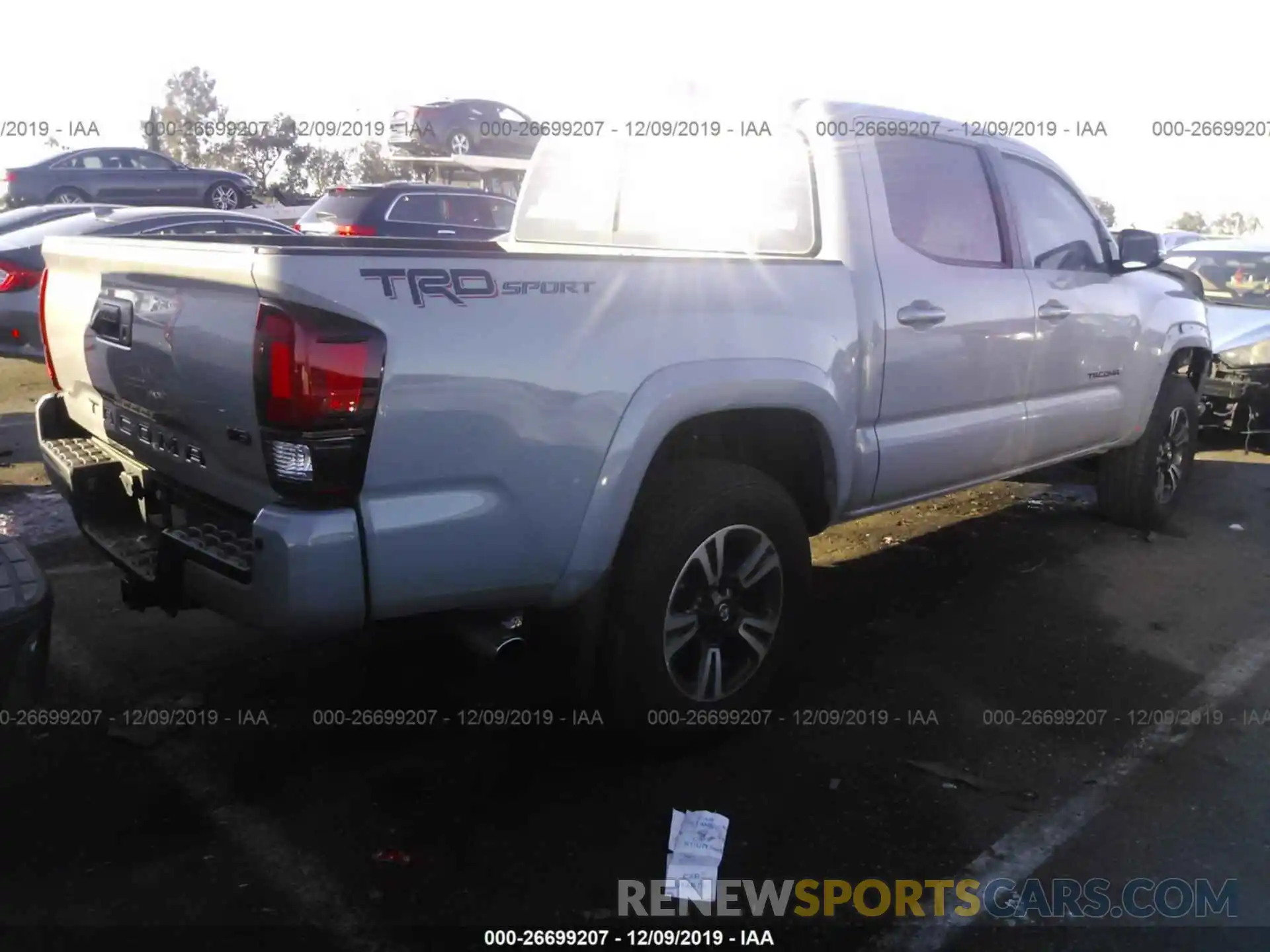 4 Photograph of a damaged car 3TMAZ5CN7KM084106 TOYOTA TACOMA 2019