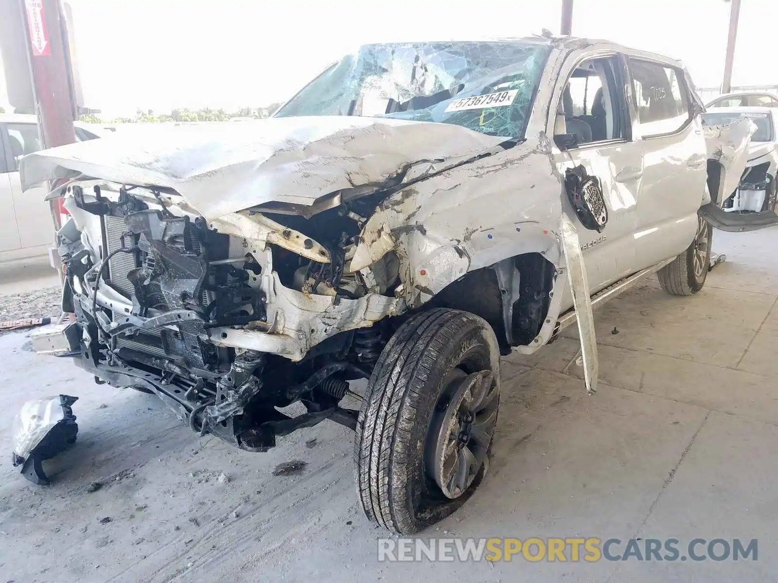 2 Photograph of a damaged car 3TMAZ5CN7KM084767 TOYOTA TACOMA 2019