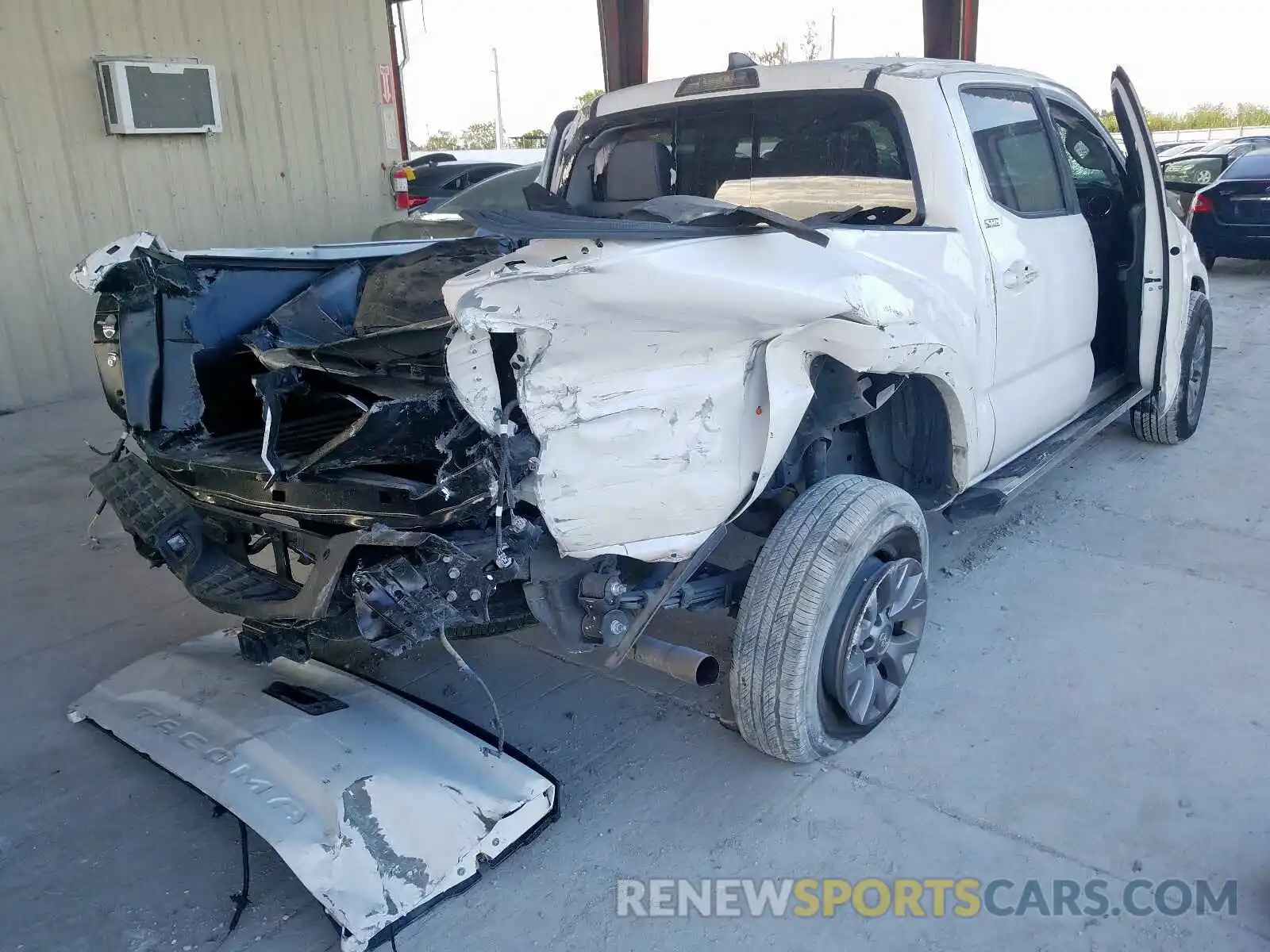 4 Photograph of a damaged car 3TMAZ5CN7KM084767 TOYOTA TACOMA 2019