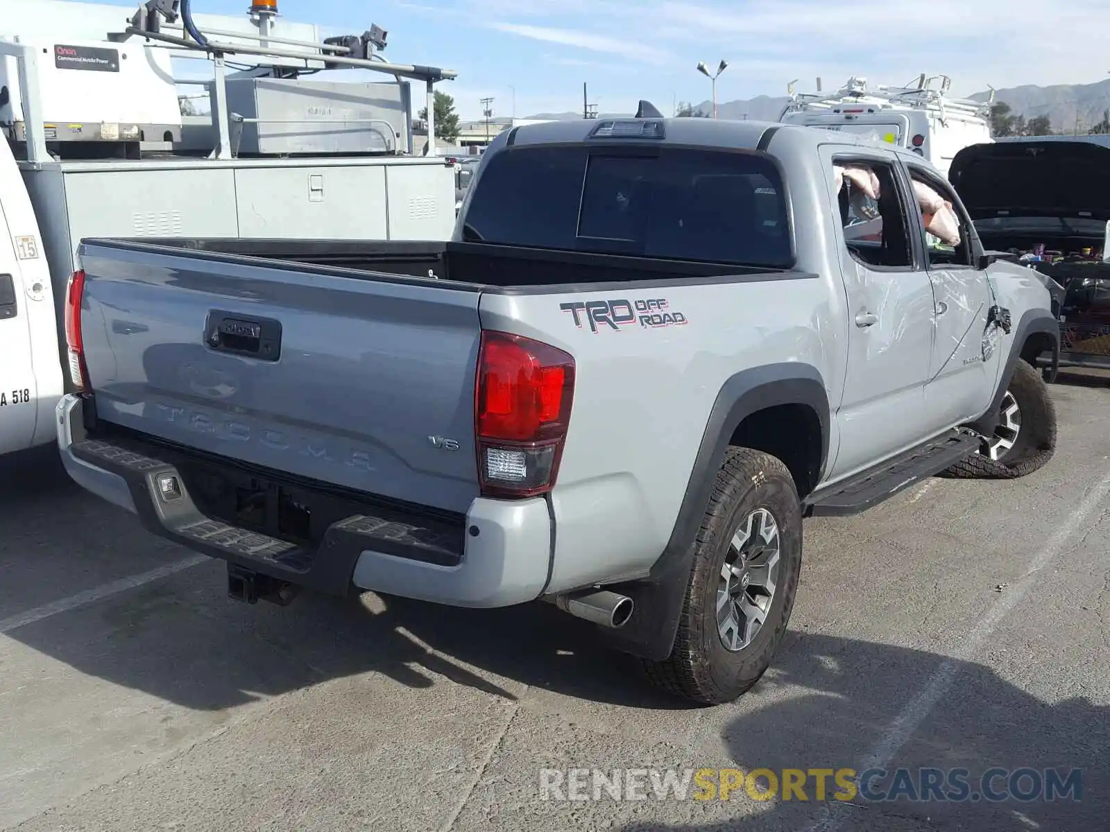 4 Photograph of a damaged car 3TMAZ5CN7KM087510 TOYOTA TACOMA 2019