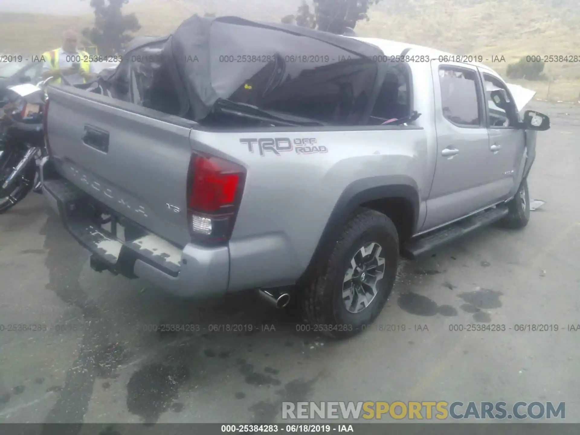 4 Photograph of a damaged car 3TMAZ5CN7KM087846 TOYOTA TACOMA 2019