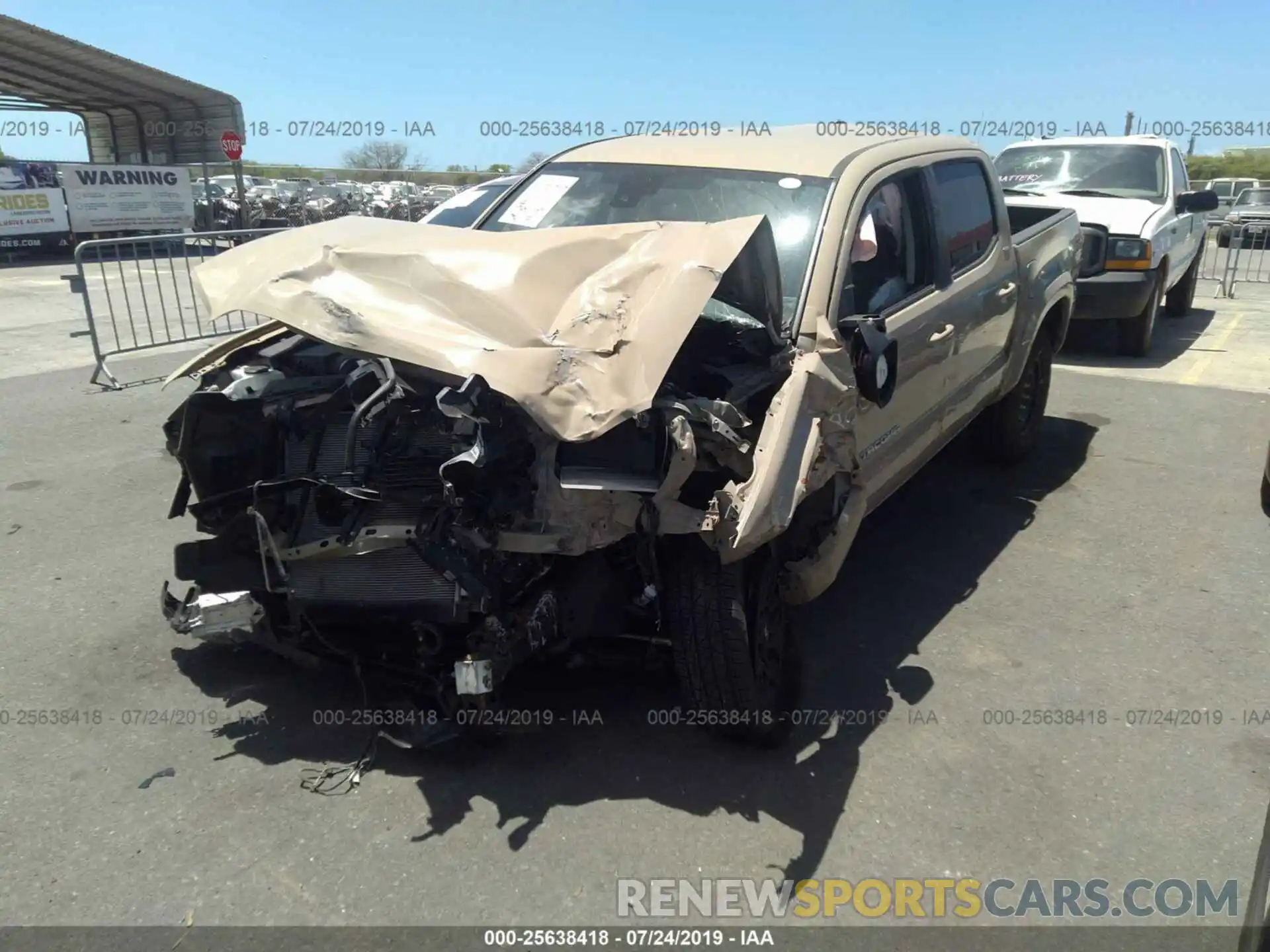 2 Photograph of a damaged car 3TMAZ5CN7KM090293 TOYOTA TACOMA 2019