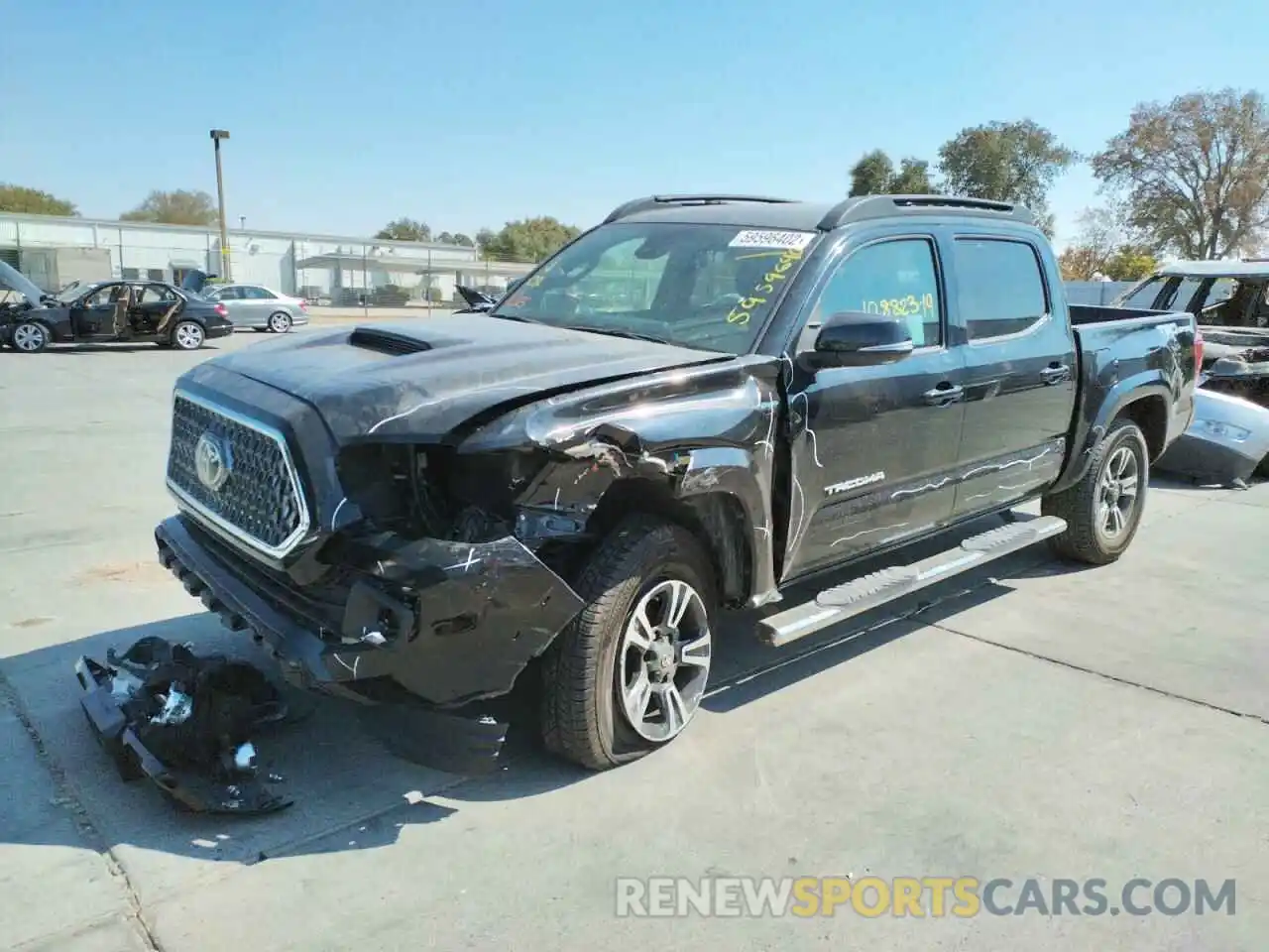 2 Photograph of a damaged car 3TMAZ5CN7KM090861 TOYOTA TACOMA 2019