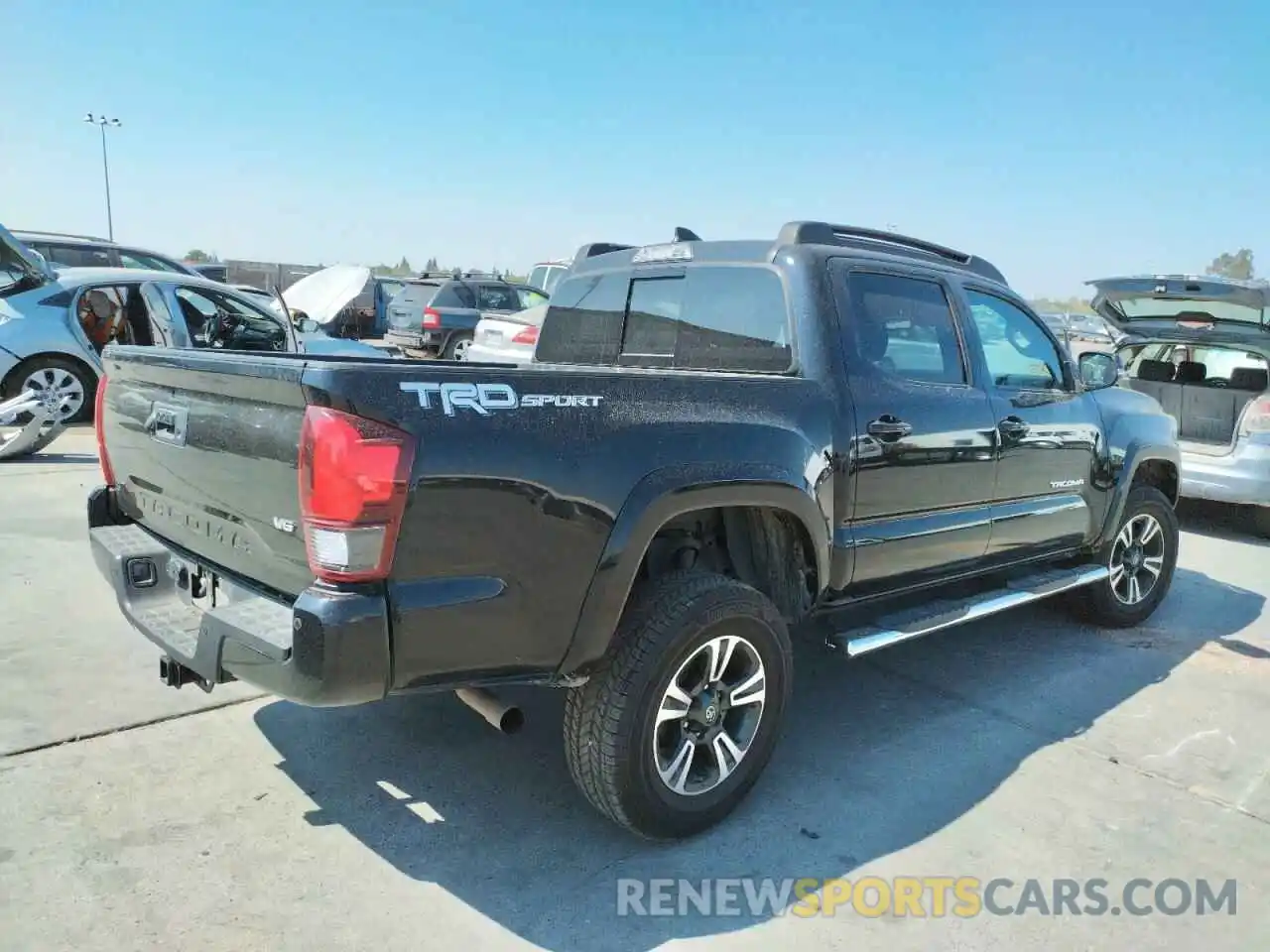 4 Photograph of a damaged car 3TMAZ5CN7KM090861 TOYOTA TACOMA 2019