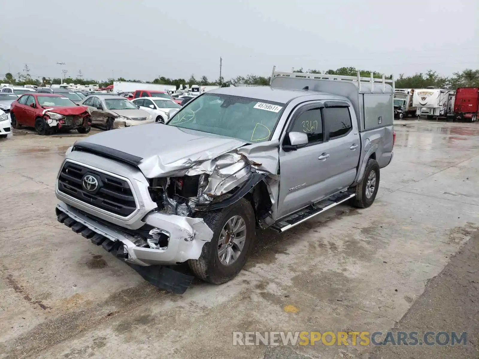 2 Photograph of a damaged car 3TMAZ5CN7KM091394 TOYOTA TACOMA 2019